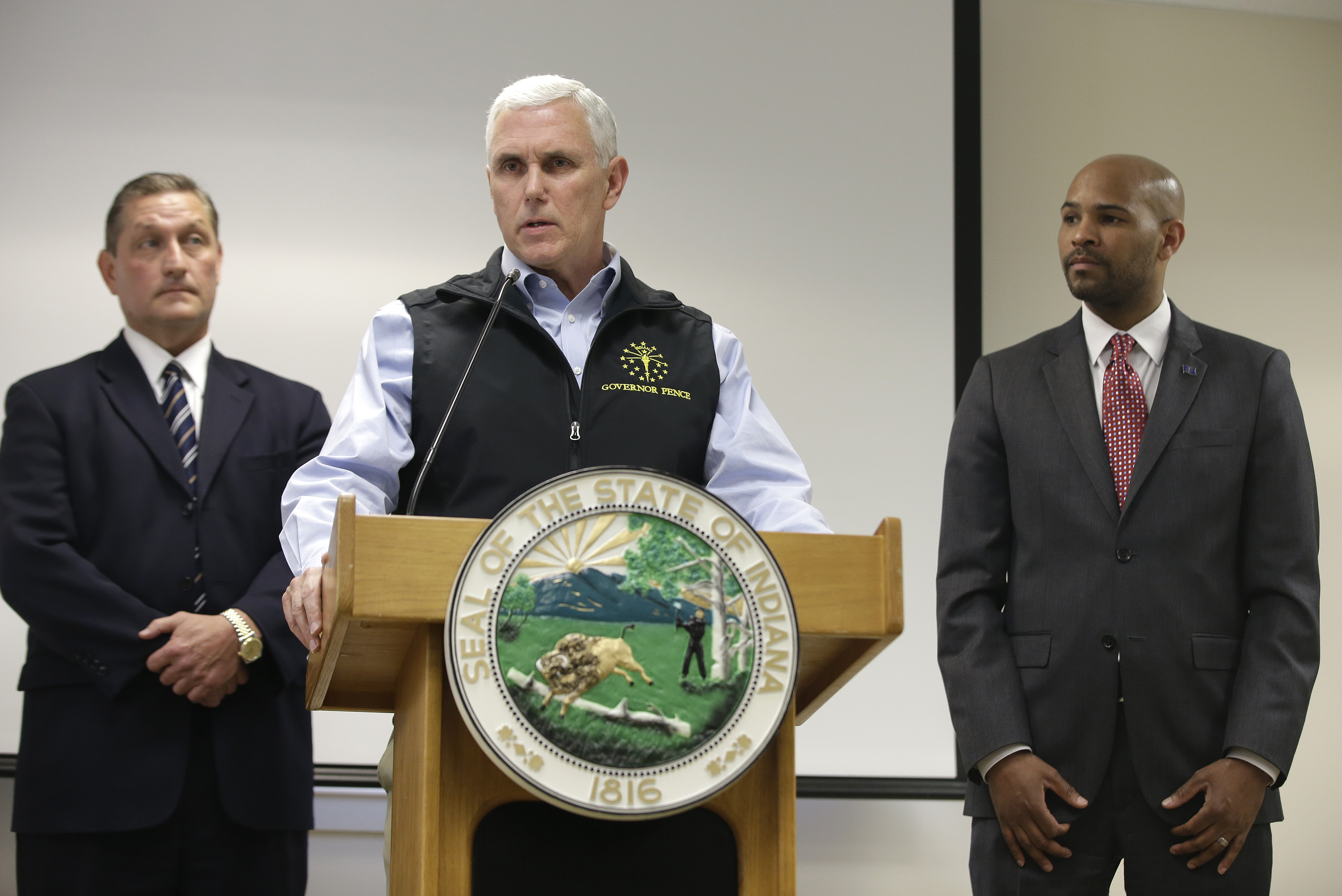Indiana Gov. Mike Pence responds to a question during a news conference, March 25, 2015, in Scottsburg, Ind.
