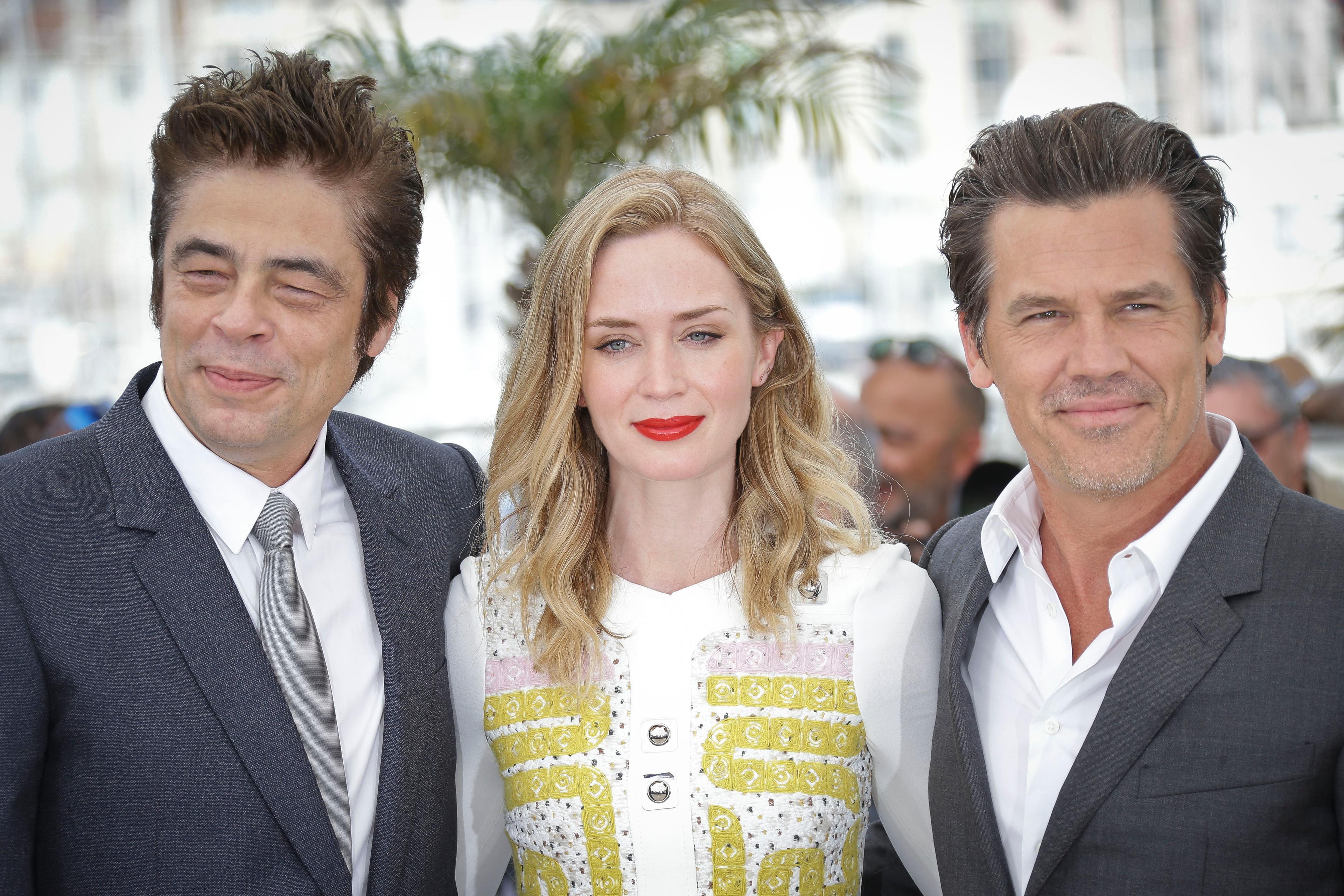 Benicio del Toro, Emily Blunt and Josh Brolin pose for photographers during a photo call for the film Sicario, at the 68th international film festival, Cannes, France