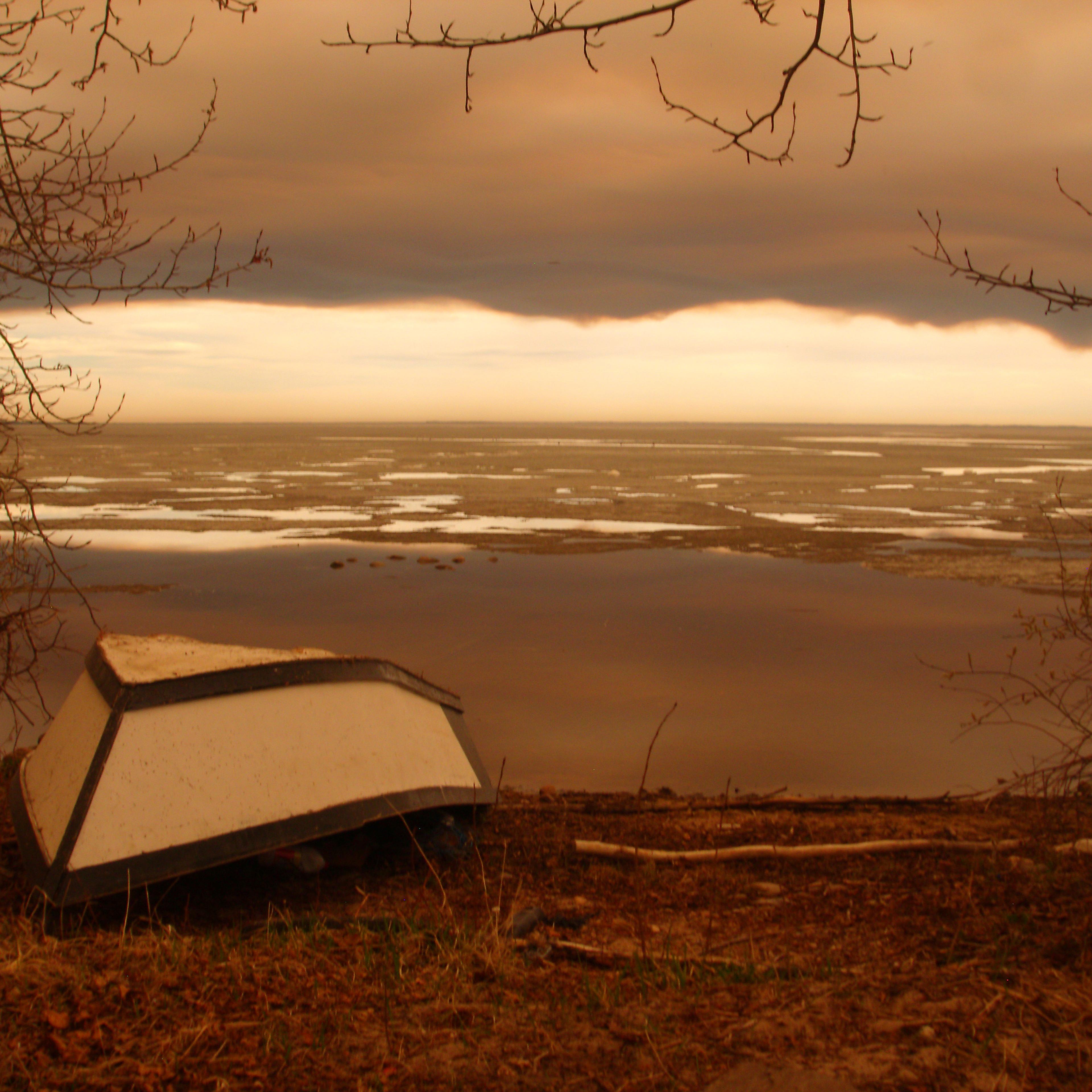 Smoke from Fort McMurray-area wildfires that forced evacuations hangs over the still-frozen Lac La Loche across the provincial border in La Loche