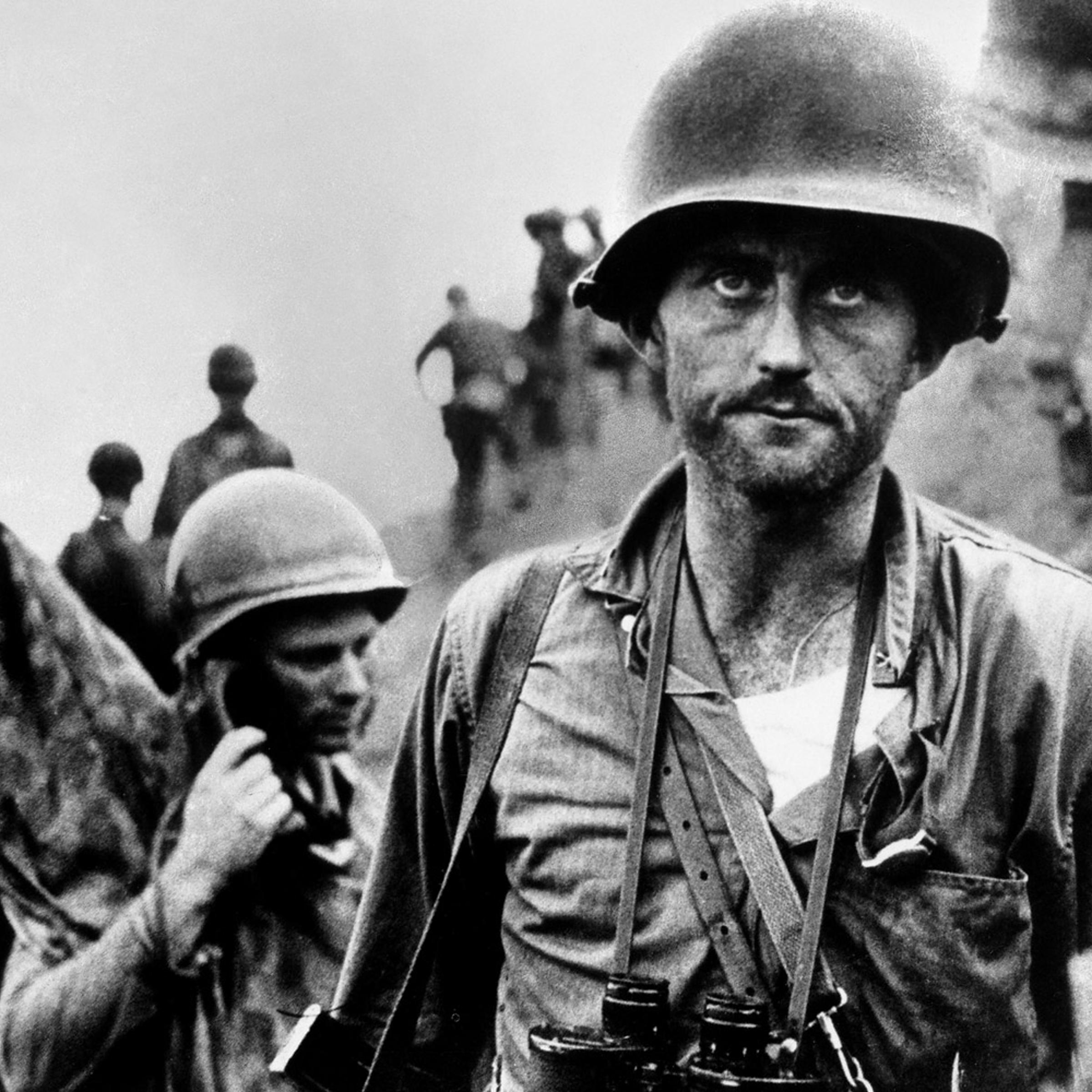 Marine Capt. Francis Ike Fenton looking grim after learning his first sergeant was killed and his unit is out of ammunition during a heavy North Korean counterattack along the Naktong River in August 1950.