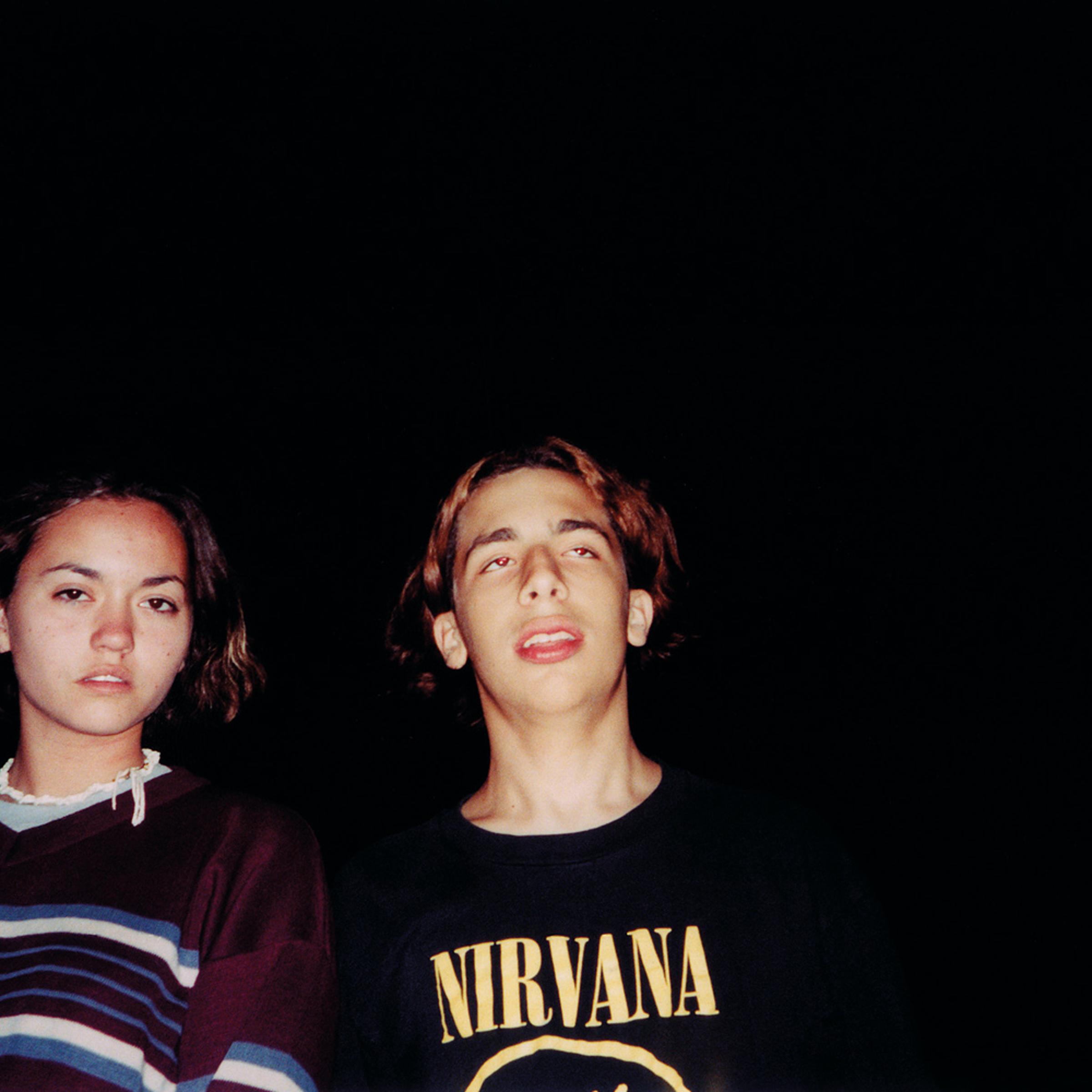 <i>Here are Jeff and I in the suburbs of Chicago. He gave me my first cigarette and taught me "Come As You Are" on guitar. He was the rebel of our group, obsessed with Cobain. I haven't been able to track him down for years.</i>