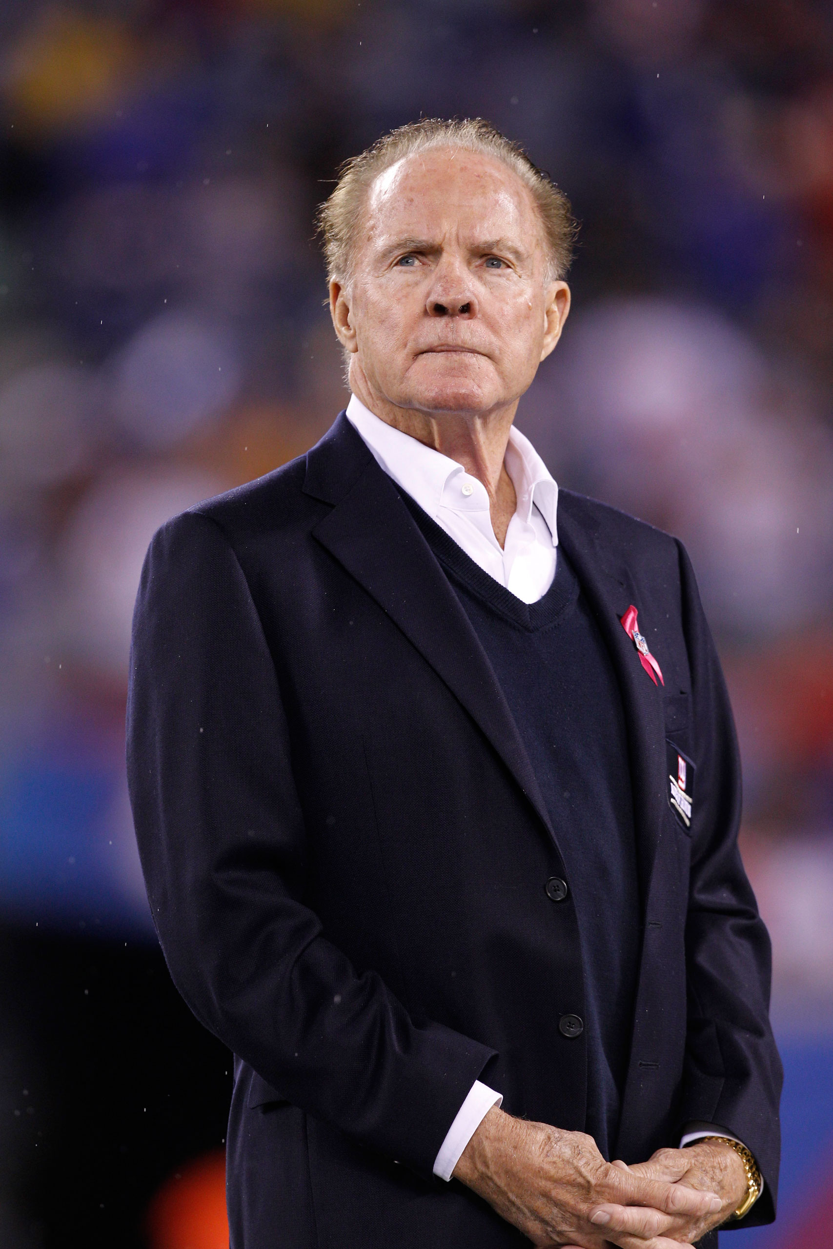 Former New York Giants player Frank Gifford looks on during the Ring of Honor ceremony during halftime of an NFL football game between the Chicago Bears and the New York Giants at New Meadowlands Stadium Sunday, Oct. 3, 2010, in East Rutherford, N.J. (AP