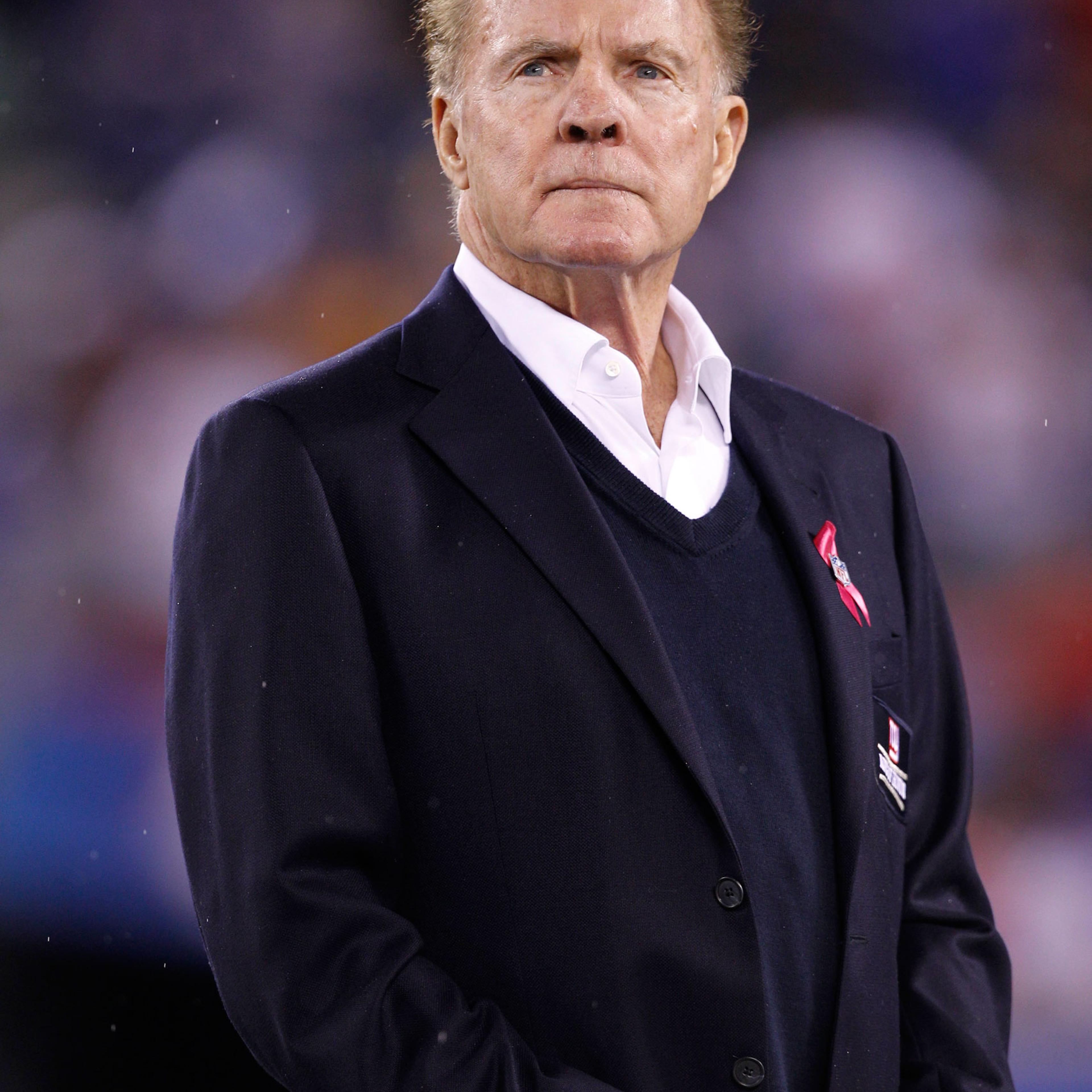 Former New York Giants player Frank Gifford looks on during the Ring of Honor ceremony during halftime of an NFL football game between the Chicago Bears and the New York Giants at New Meadowlands Stadium Sunday, Oct. 3, 2010, in East Rutherford, N.J. (AP