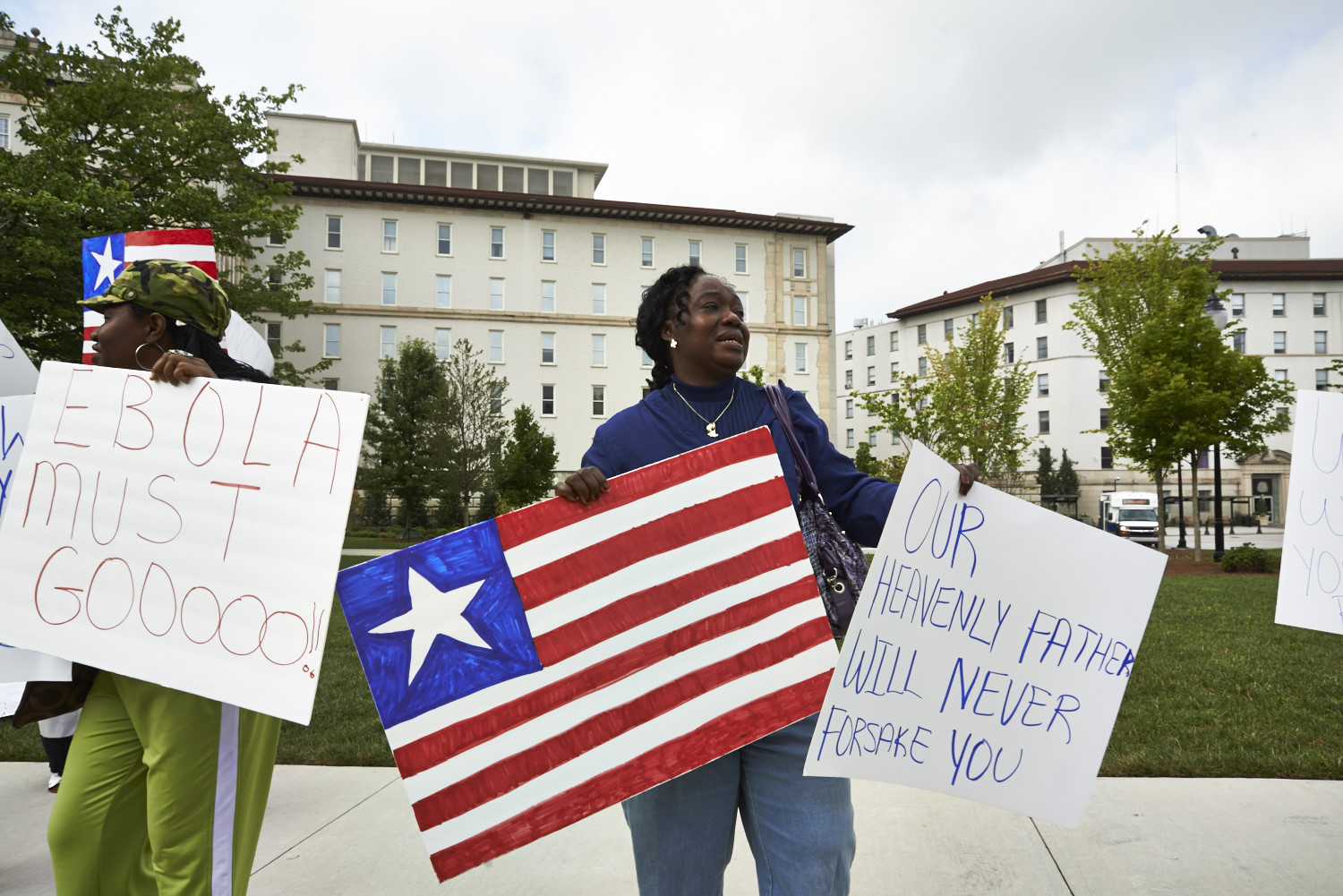 Garmai Kpardeh, a member of the Liberian Association of Metropolitan Atlanta rallying in front of Emory University Hospital, August 9.