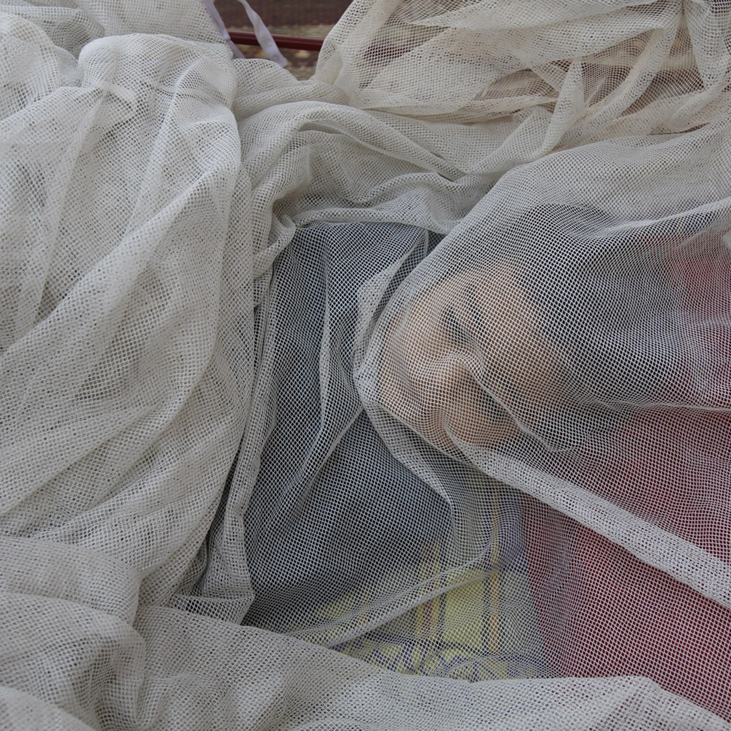 June 23, 2012. Rehana, 11 months, sleeps beneath a mosquito net on the outskirts of Jalalabad, east of Kabul, Afghanistan.