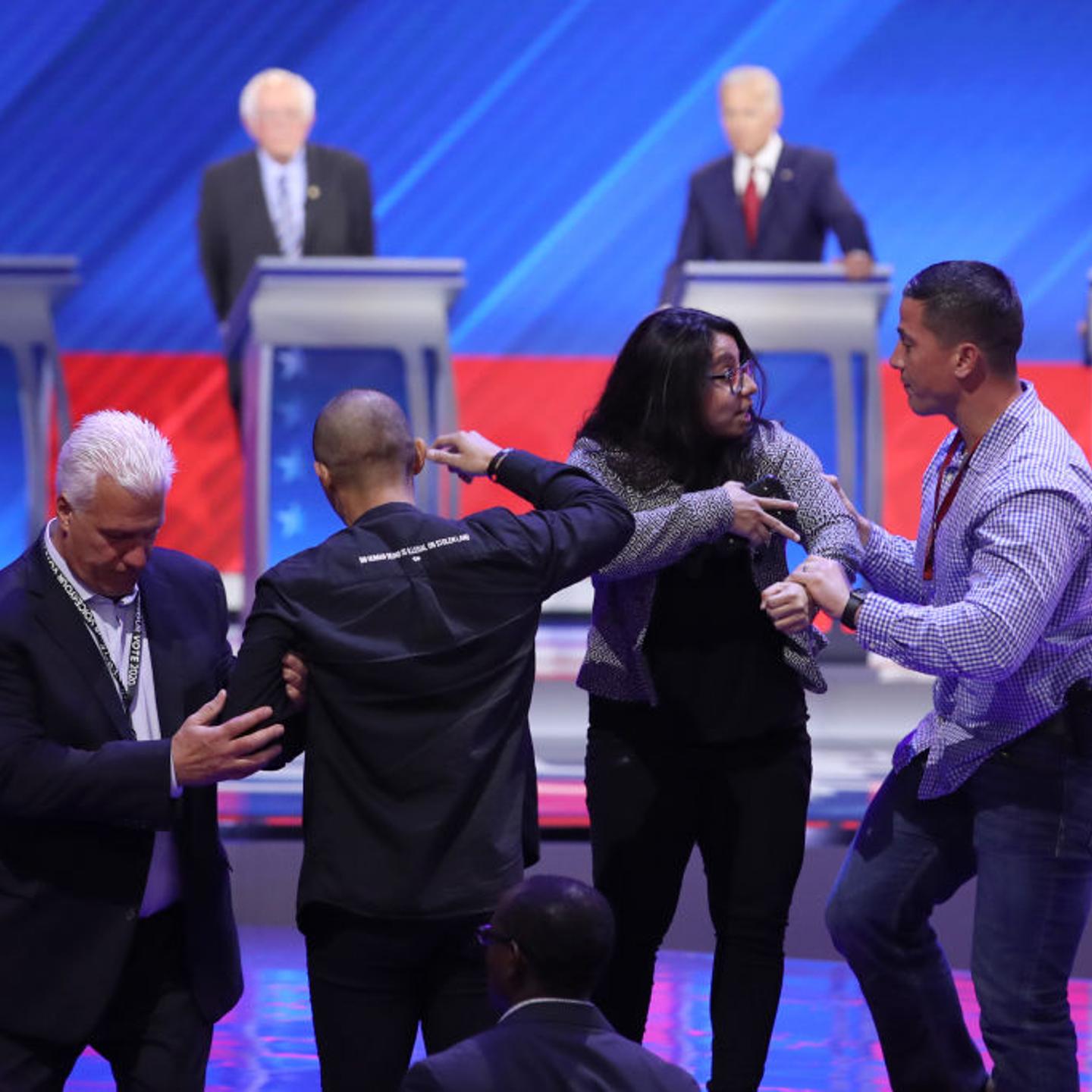protesters-at democratic debate daca