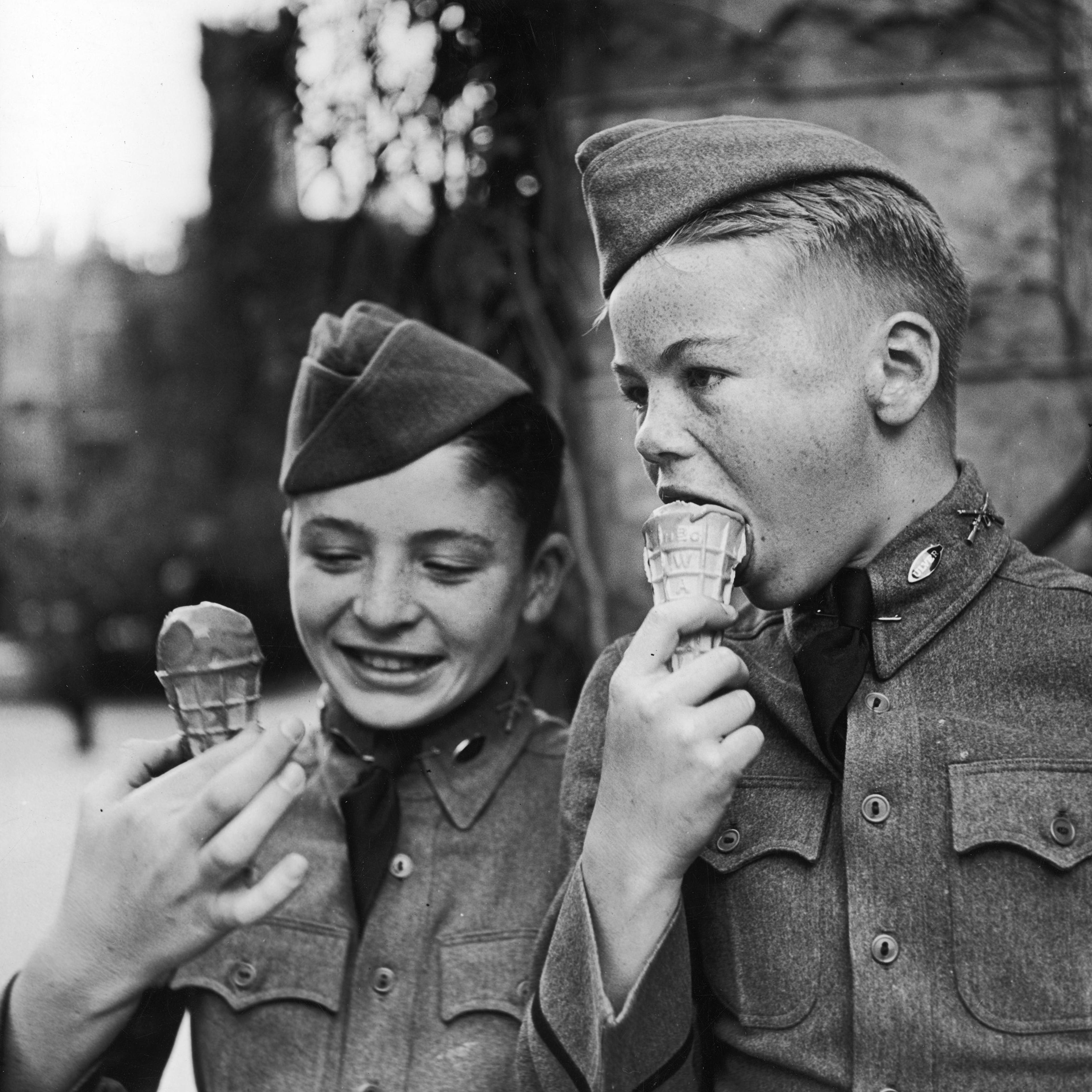 Two young boys eating ice cream, 1939.