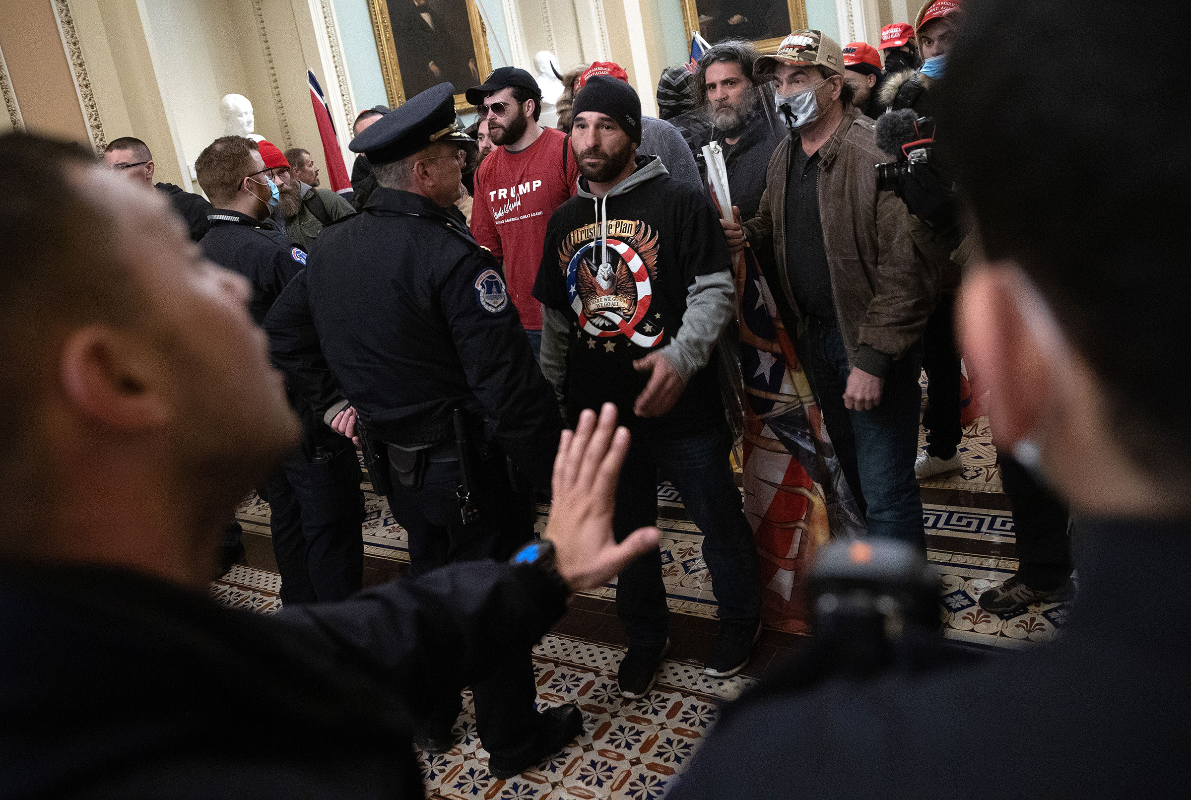 A pro-Trump mob confronts U.S. Capitol police after the group stormed the building on Jan. 06, 2021.