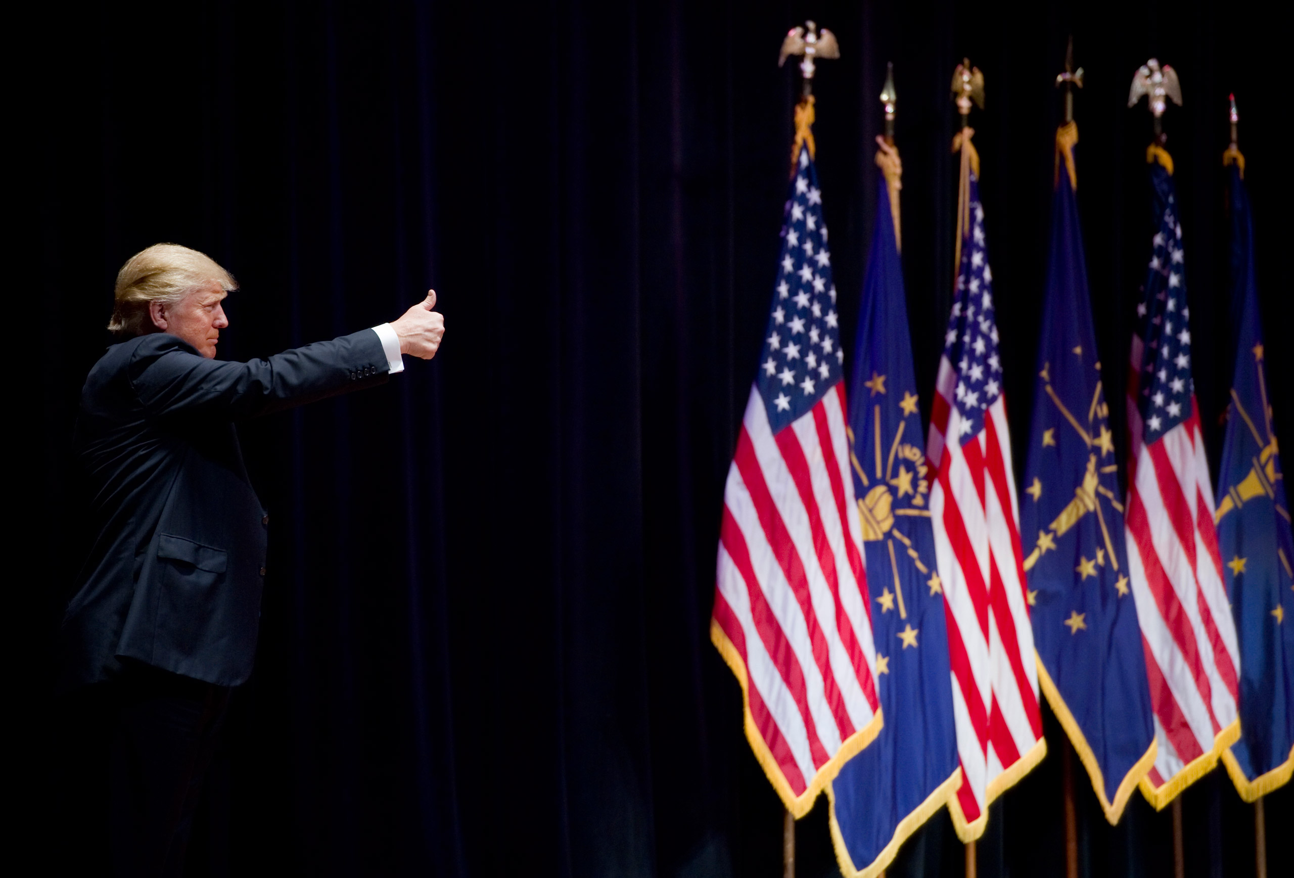 Donald Trump, frontrunner for the Republican presidential nomination, acknowledges the crowd before leaving the stage at the Aiken Theatre in the Old National Events Plaza in Evansville, Ind., Thursday afternoon. (Denny Simmons/Courier &amp; Press via AP