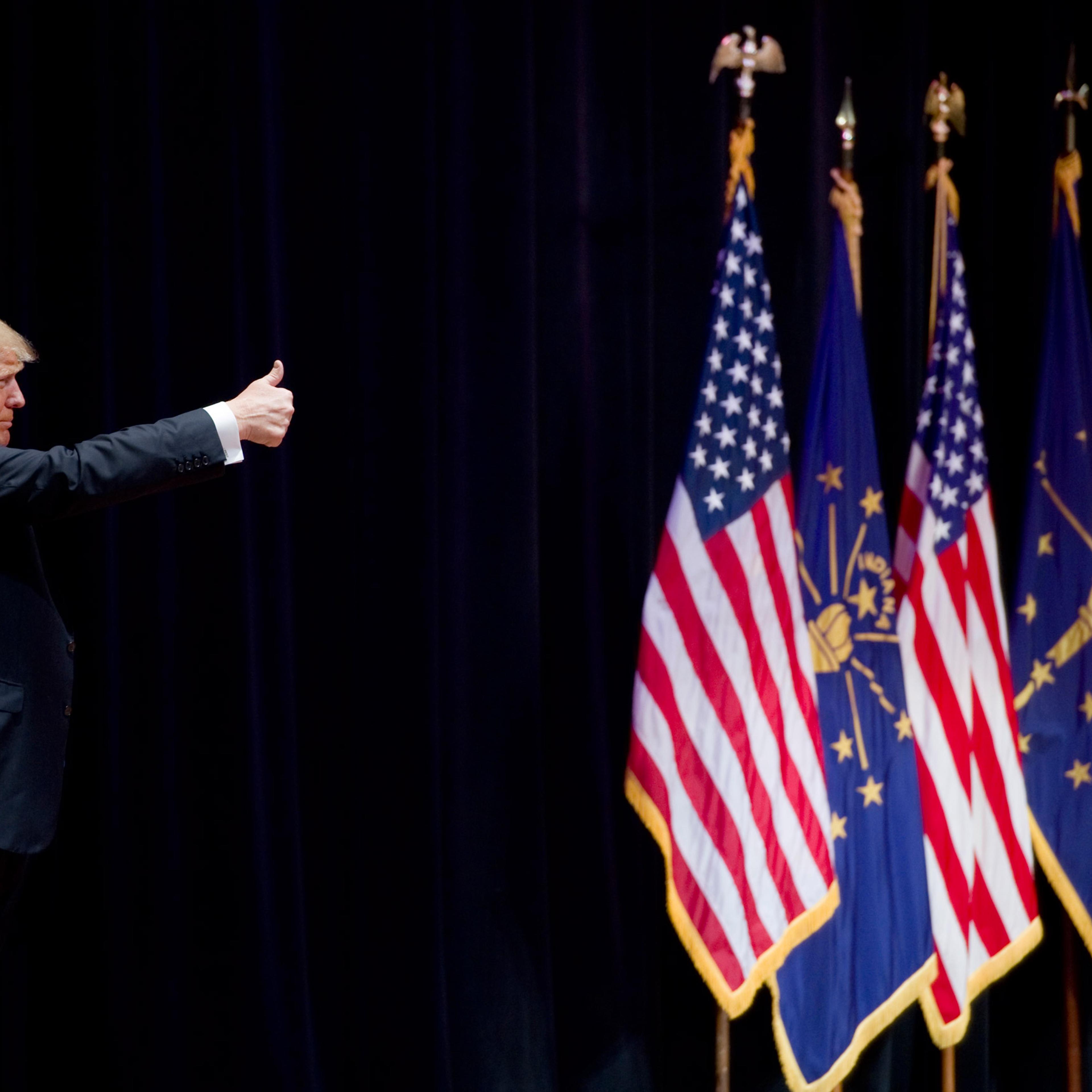 Donald Trump, frontrunner for the Republican presidential nomination, acknowledges the crowd before leaving the stage at the Aiken Theatre in the Old National Events Plaza in Evansville, Ind., Thursday afternoon. (Denny Simmons/Courier & Press via AP