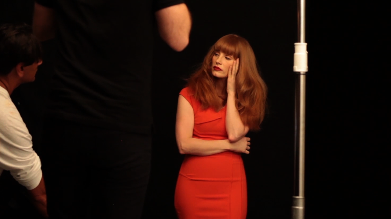 Jessica Chastain poses for photographer Peter Hapak during a TIME photo shoot