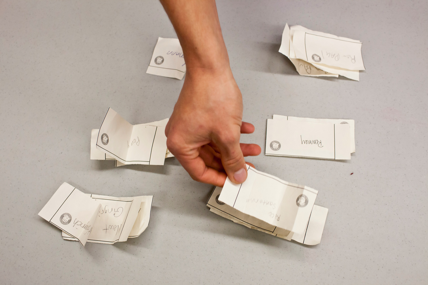 Votes are counted at a caucus site at Summit Middle School on Tuesday, January 3, 2012 in Johnston, IA.