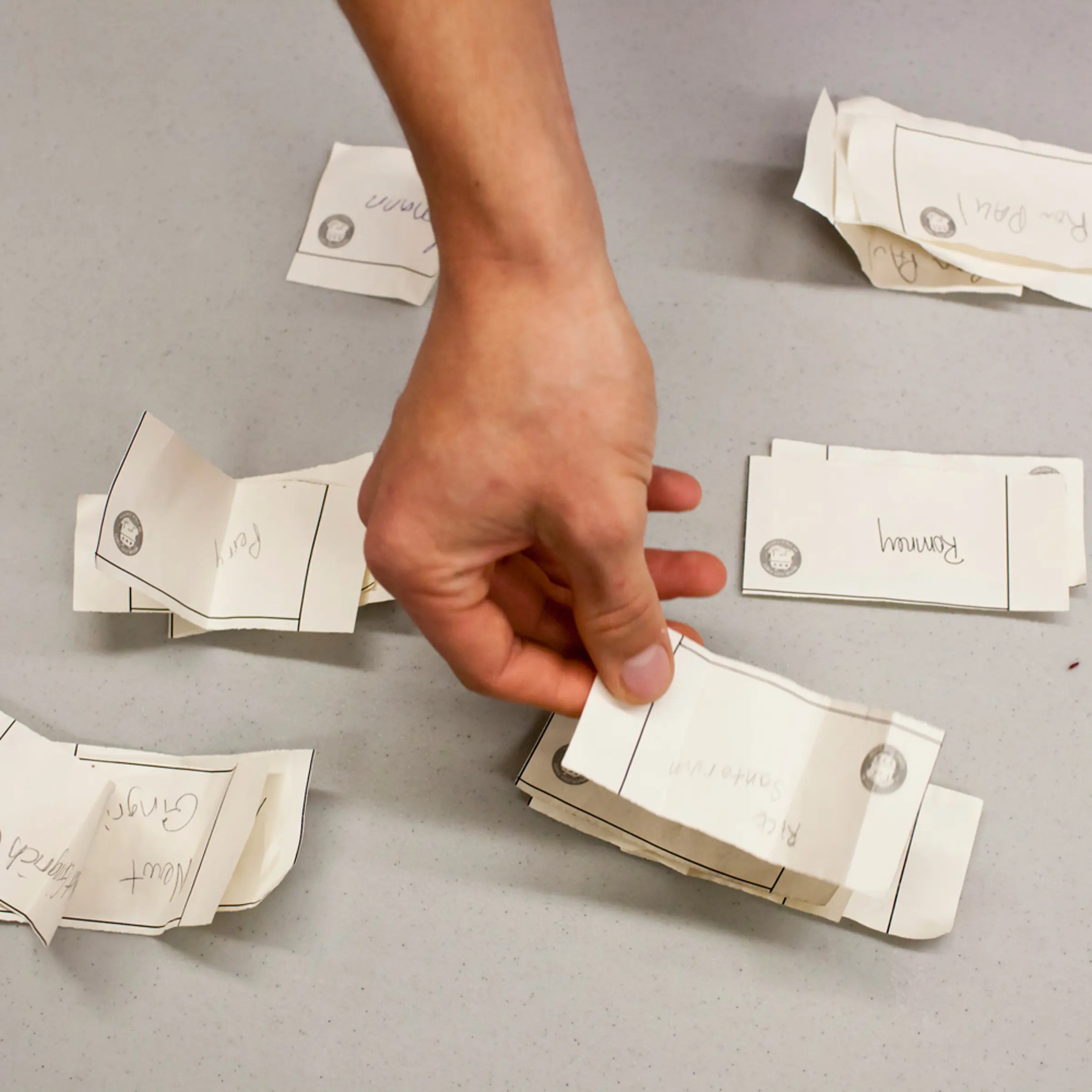 Votes are counted at a caucus site at Summit Middle School on Tuesday, January 3, 2012 in Johnston, IA.
