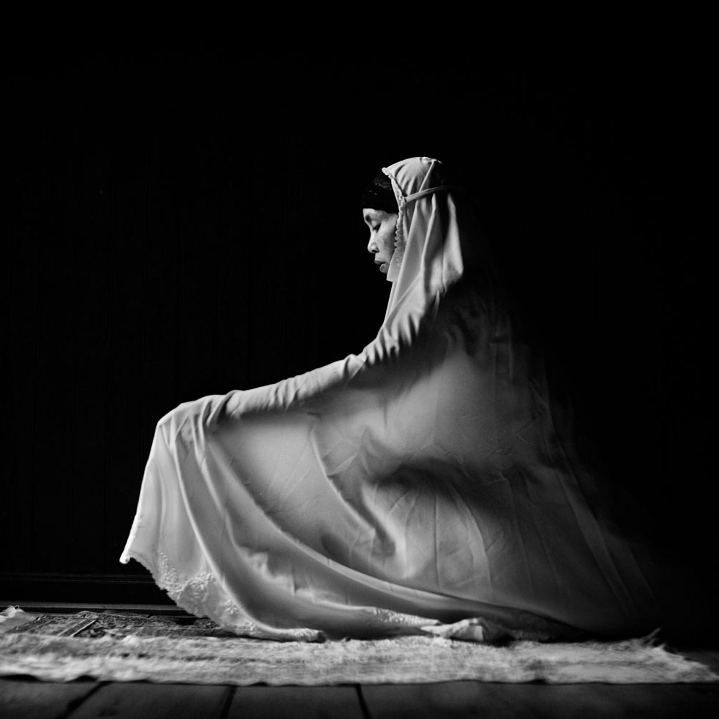 "In my journey through Thailand’s troubled deep south, providence took me to Narathiwat town and finally to the house of the Raja. This once magnificent residence is now dilapidated, but still holds a haunting power that caught me in its spell as soon as I set foot in it. Its atmosphere of dignified solitude, shrouded in shadow and light, pulled me out from the conflict and bloodshed of the present into a dimension filled with timeless spirituality." 2010<br>
<i>Caption comments courtesy of Xavier Comas</i>