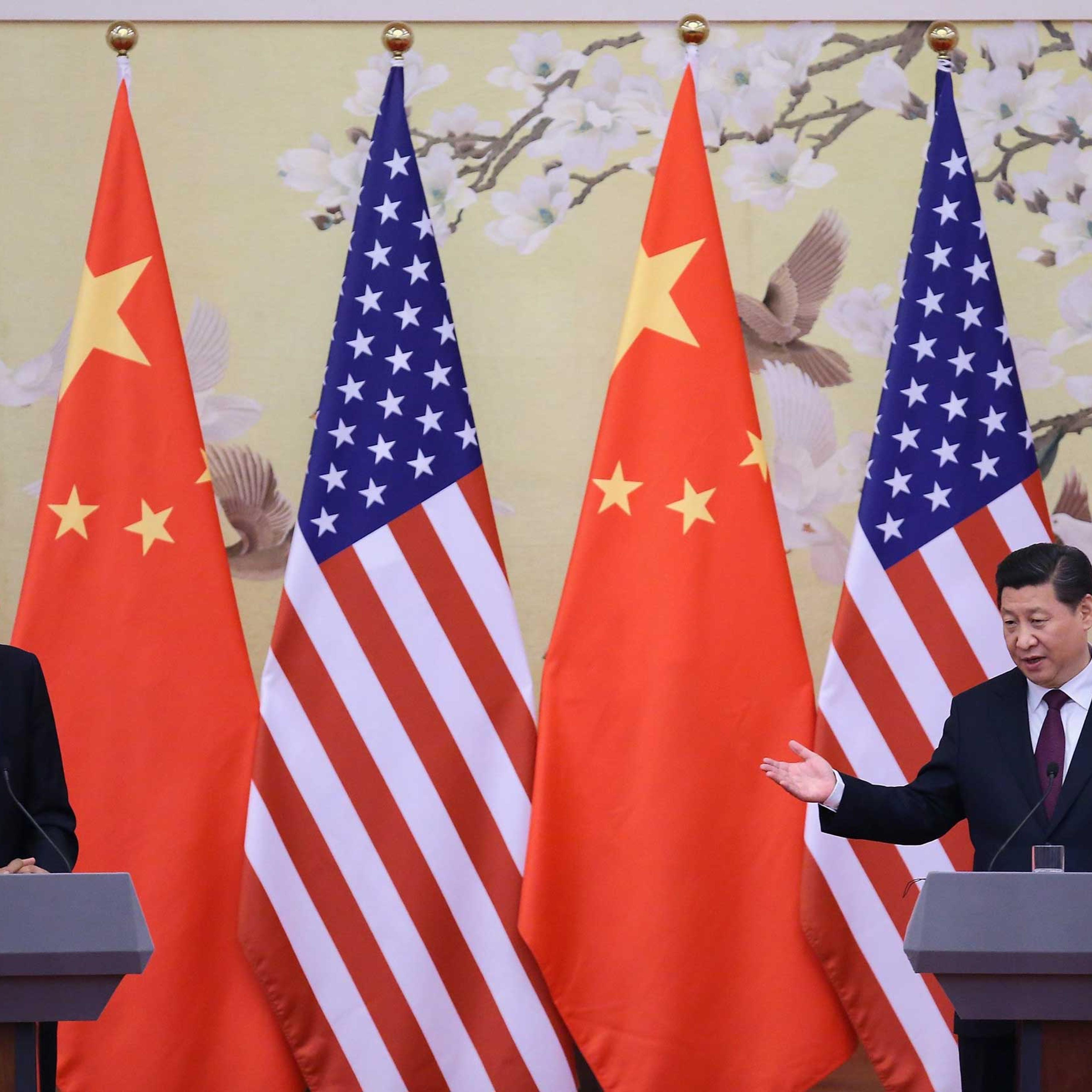 President Barack Obama and Chinese President Xi Jinping attend a press conference at the Great Hall of People on Nov. 12, 2014 in Beijing.