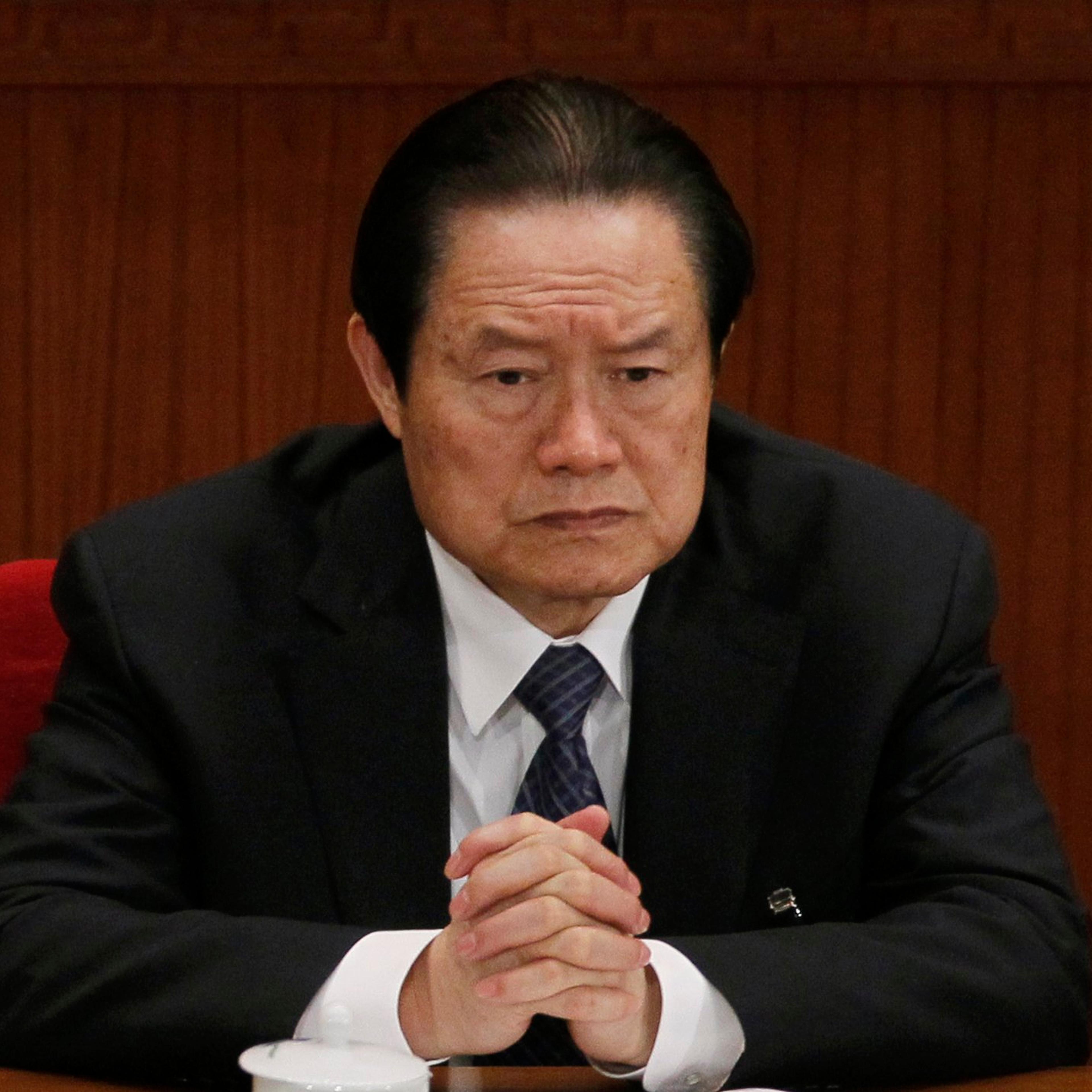 Zhou Yongkang, then Chinese Communist Party Politburo Standing Committee member in charge of security, attends a plenary session of the National People's Congress at the Great Hall of the People in Beijing on March 9, 2012.
