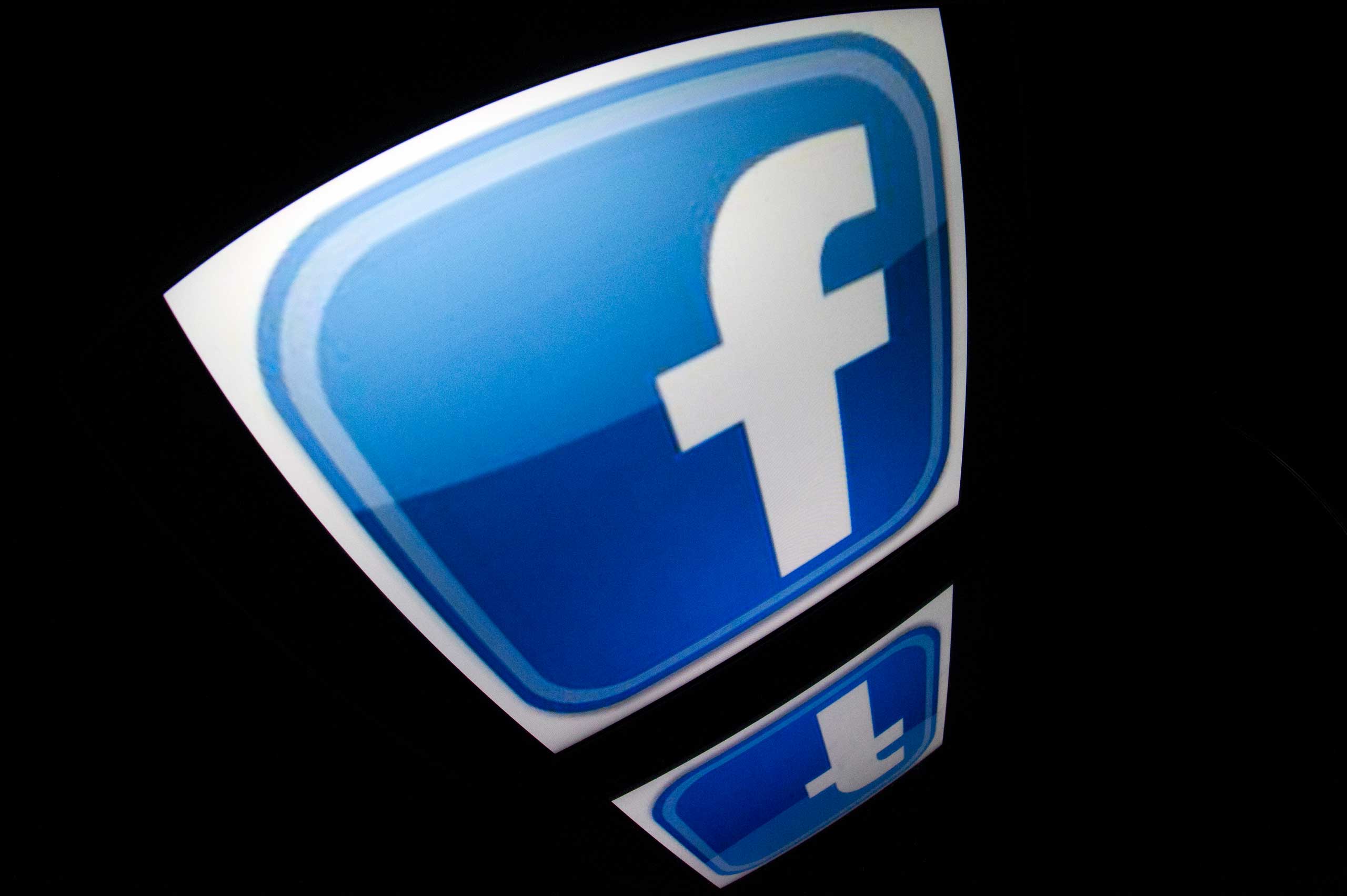 The "Facebook" logo is seen on a tablet screen on Dec. 4, 2012 in Paris.