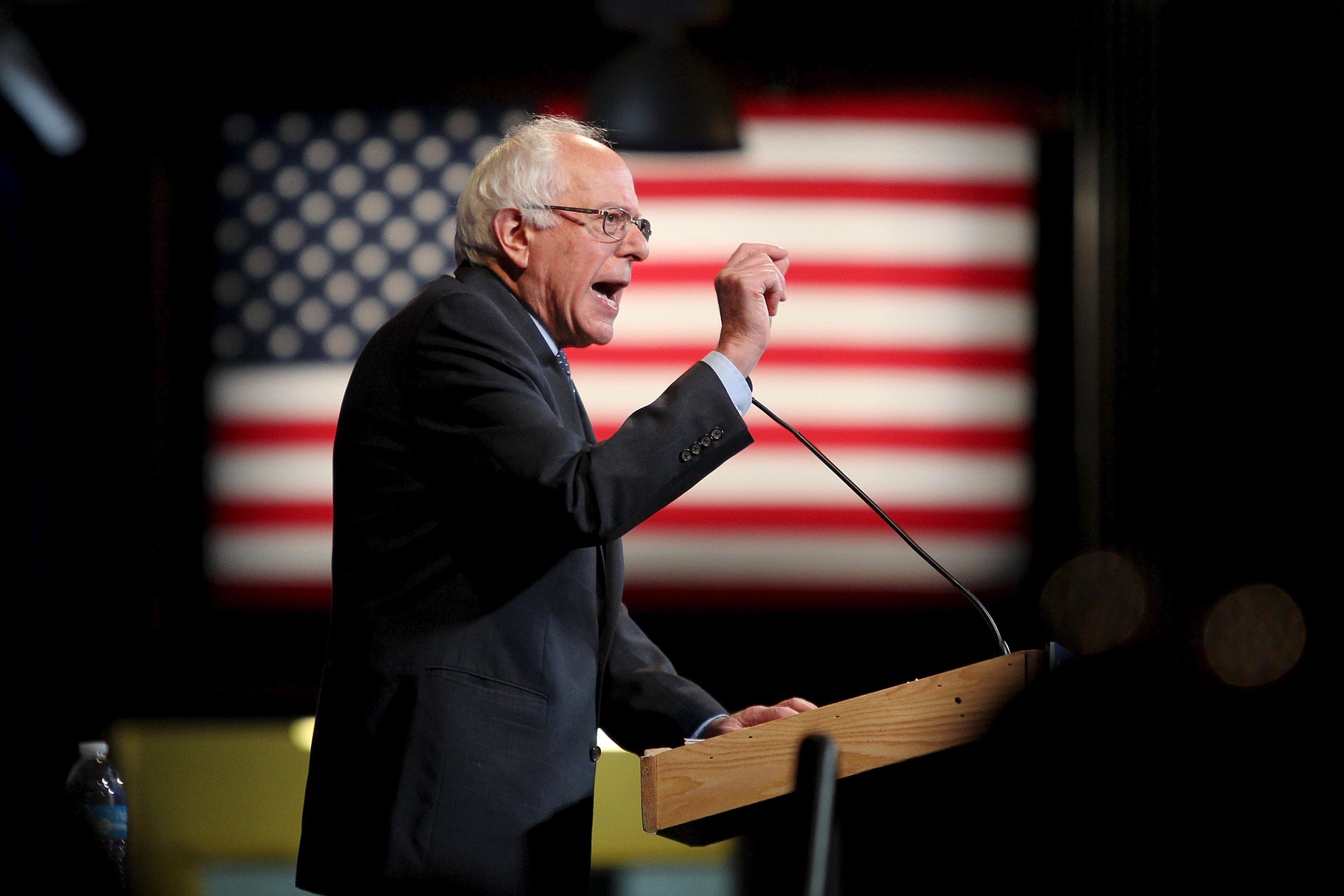 U.S. Democratic presidential candidate and U.S. Senator Bernie Sanders speaks at the New Hampshire Democratic Party's Jefferson Jackson dinner in Manchester, New Hampshire, November 29, 2015. REUTERS/Mary Schwalm - RTX1WESE