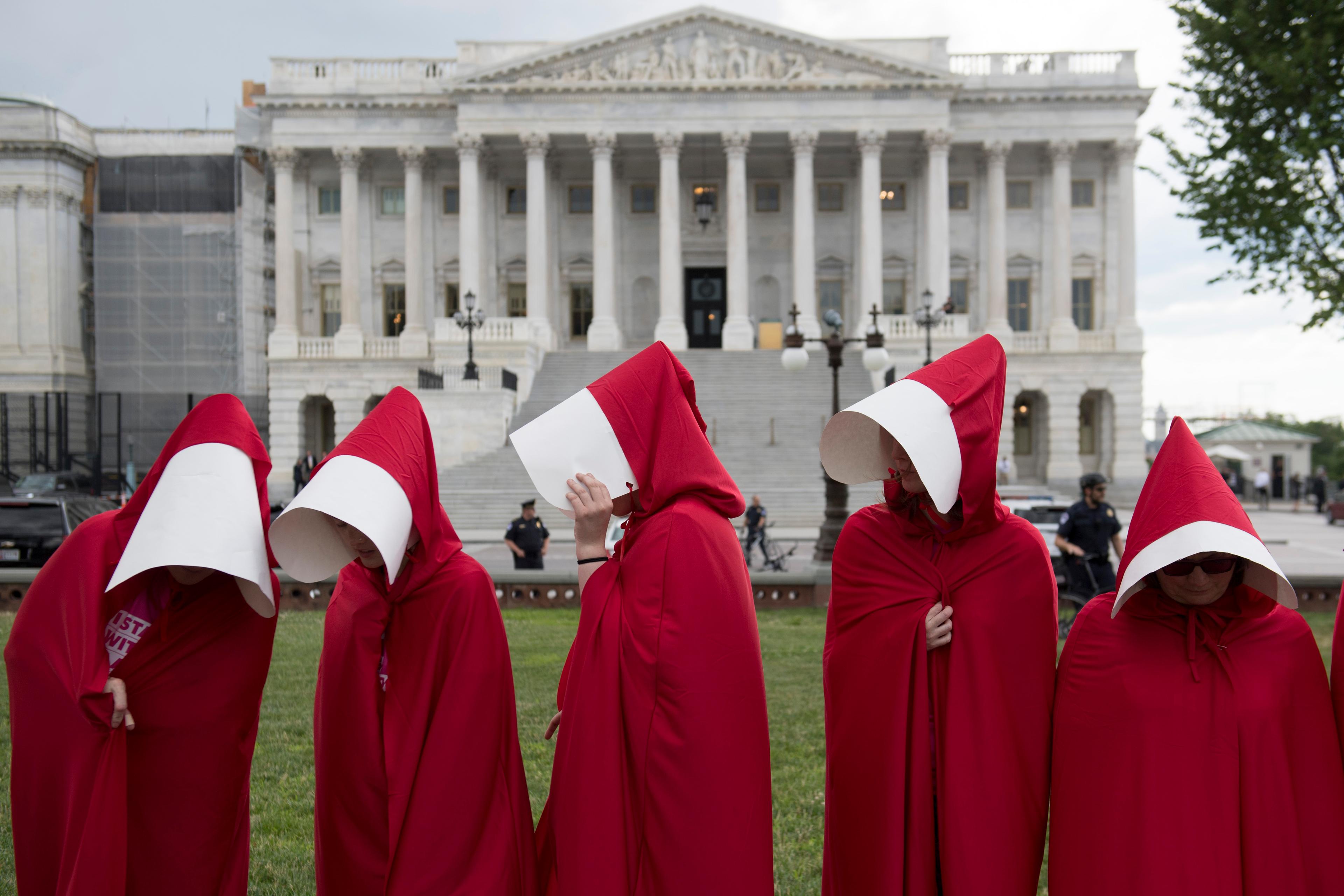 red dress handmaid's tale The Meaning Of The Red Dress In The Handmaid's Tale And Why It Matters