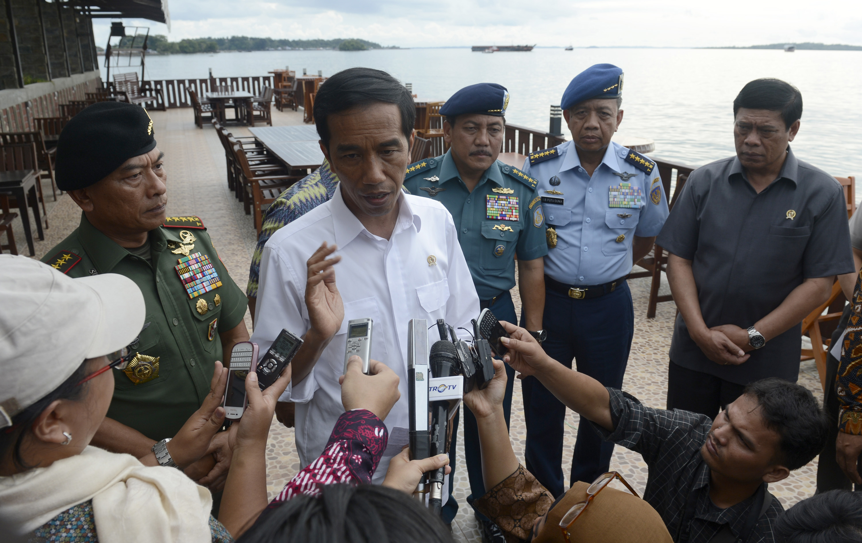 Indonesian President Joko Widodo speaks to the media about AirAsia Flight QZ8501 in Sorong, West Papua,
