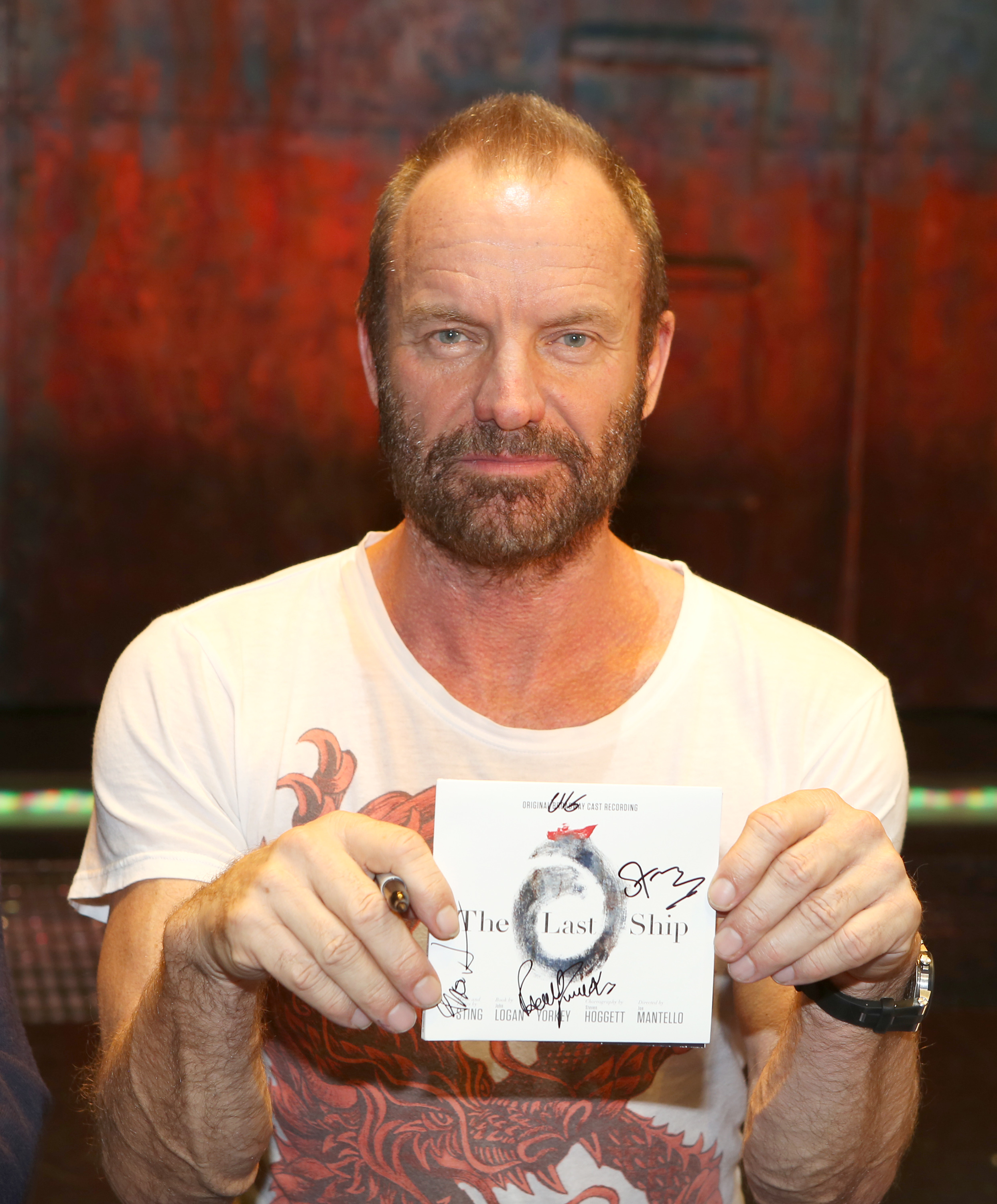 Sting and the cast of 'The Last Ship' host a CD autograph signing for the Original Broadway Cast Recording of 'The Last Ship' on stage on Dec. 21, 2014 in New York City.