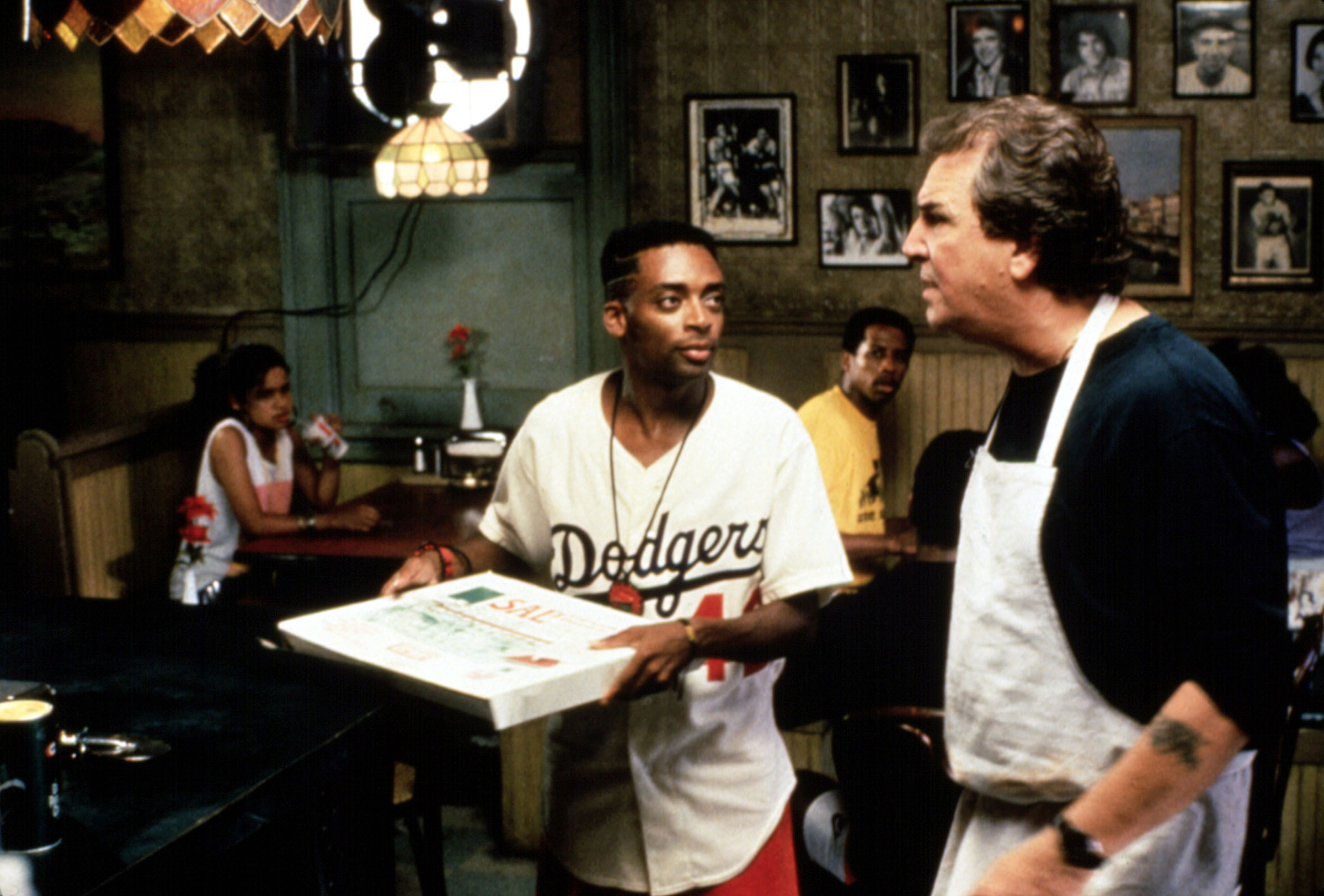 Spike Lee (center) and Danny Aiello (right) in Do the Right Thing, 1989
