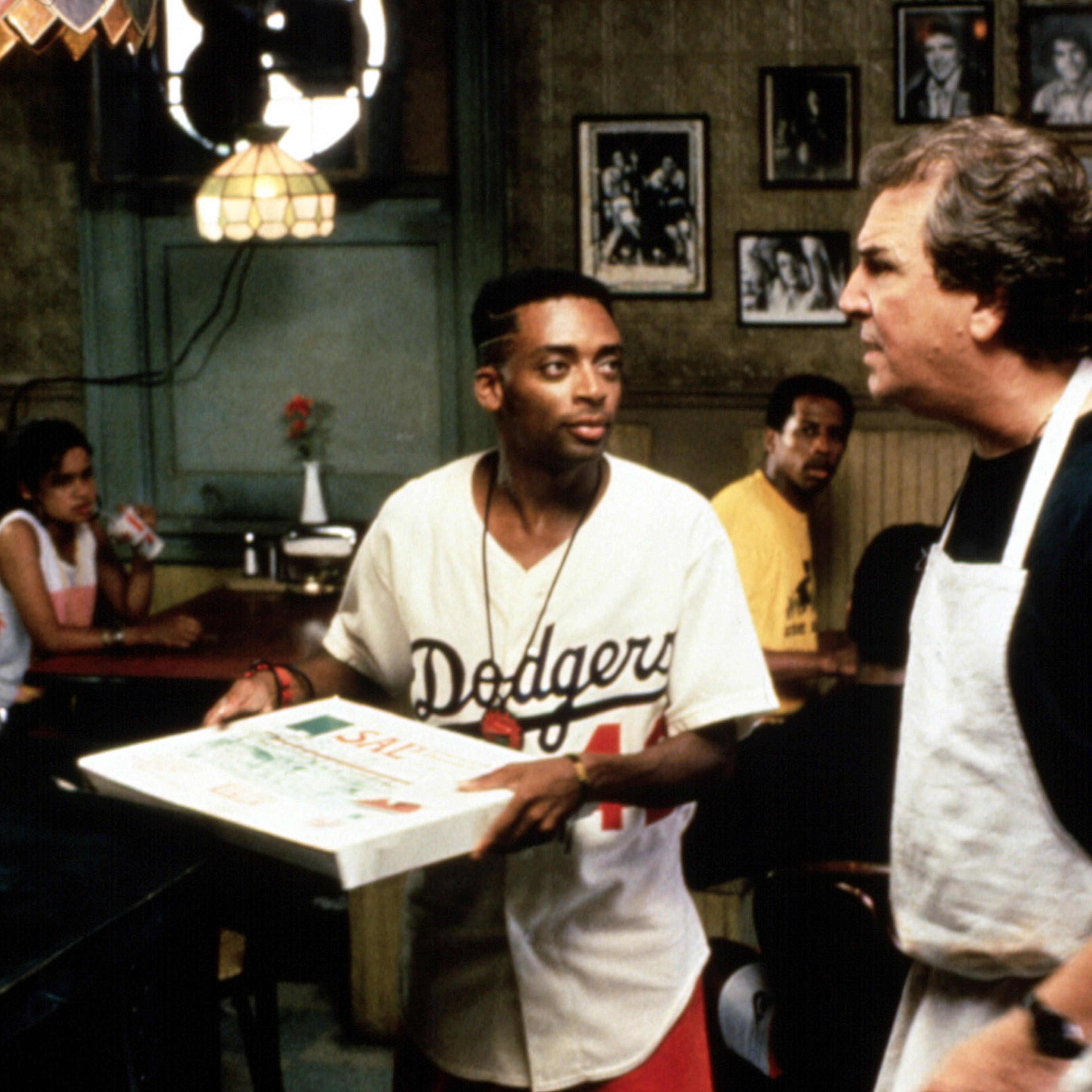 Spike Lee (center) and Danny Aiello (right) in Do the Right Thing, 1989