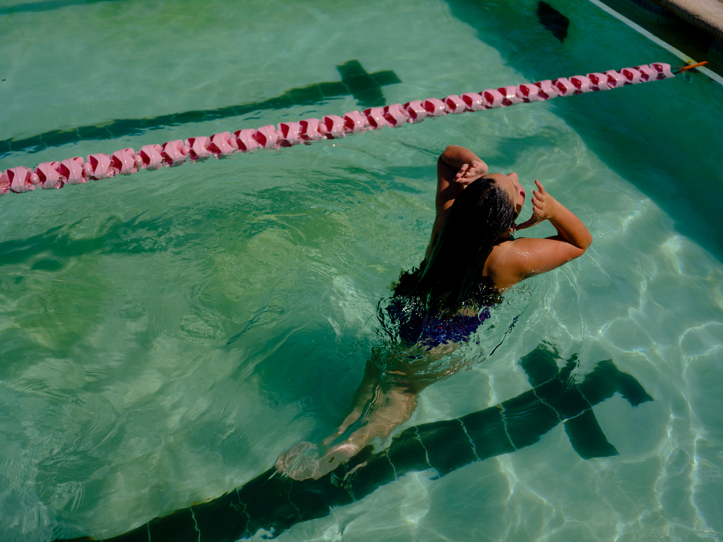 Maya, 11, swims in Houston. State law prohibits Maya from playing girls’ sports in school, but she swims on a private team. It’s not the first time being trans has prevented her from competing—she quit gymnastics years ago because she didn’t want to risk