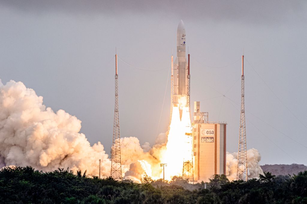 Arianespace's Ariane 5 rocket with NASAs James Webb Space Telescope onboard lifts up from the launchpad, at the Europes Spaceport, the Guiana Space Center in Kourou, French Guiana, on December 25, 2021.