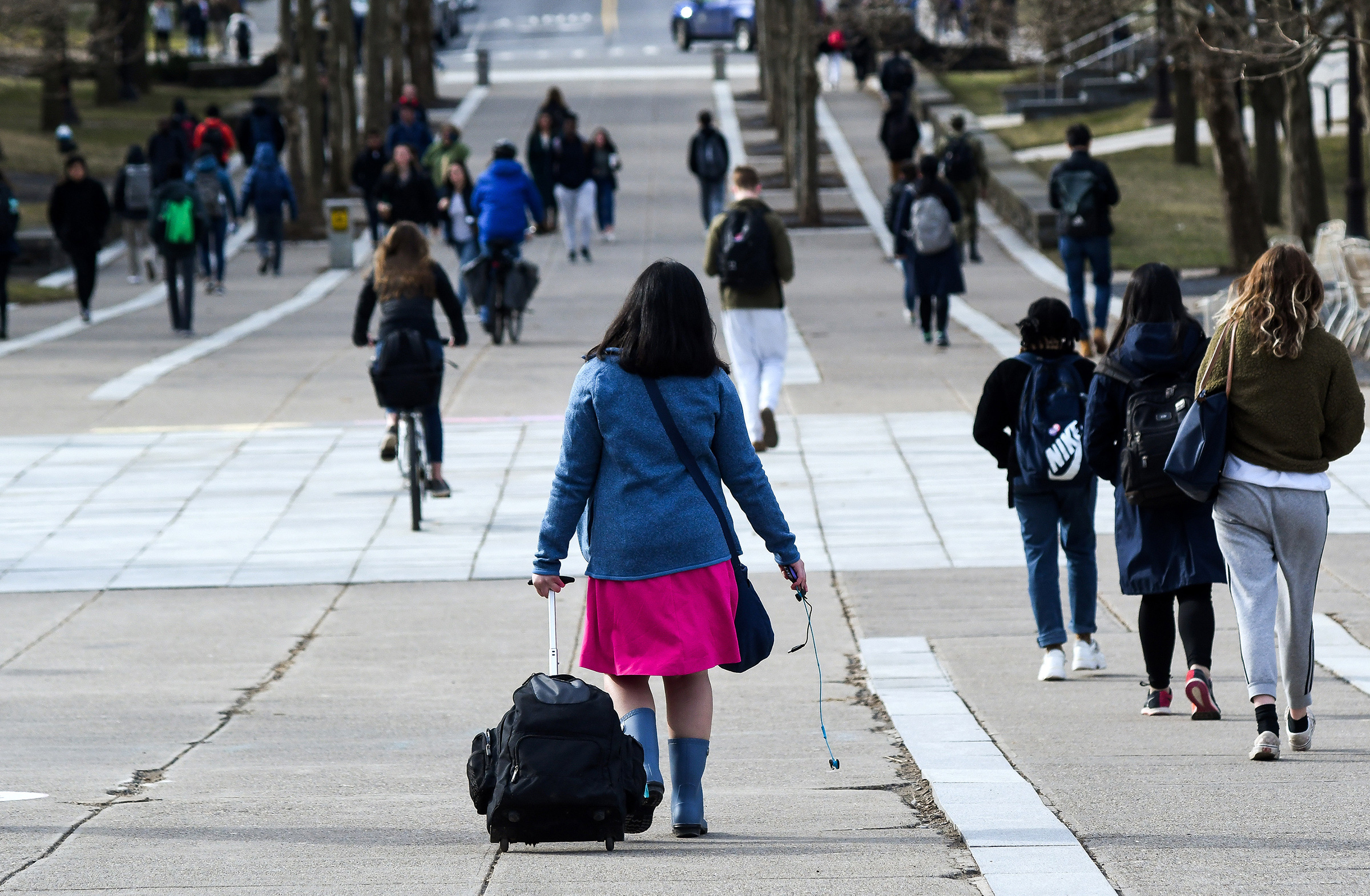 Students walk along Ho Plaza at Cornell University in Ithaca, N.Y. on March 11.