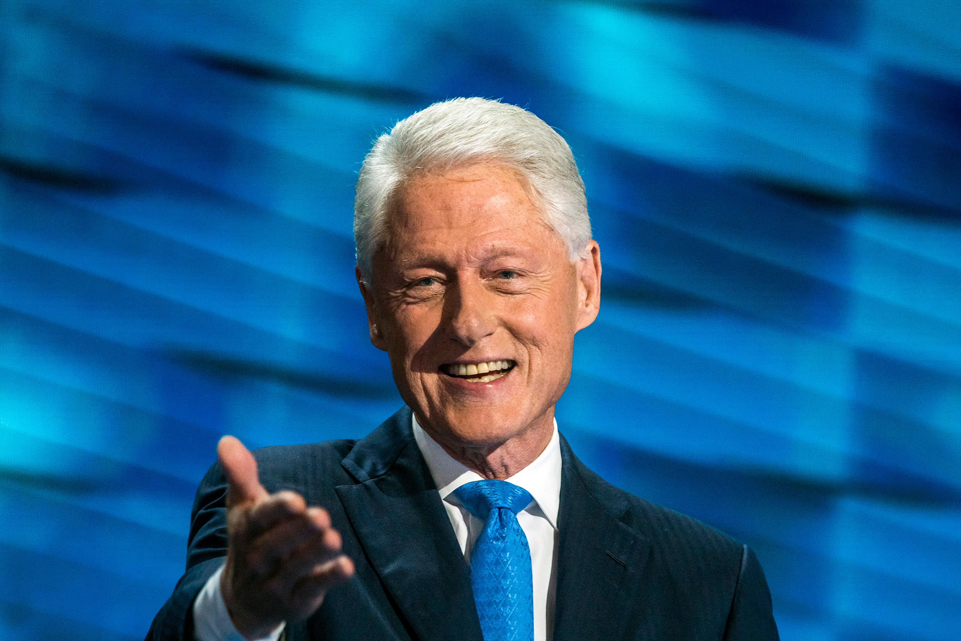 clinton in blue dress and red shoes In case you missed it: Here's the story behind that bizarre painting of Bill Clinton in a blue dress seen in Jeffrey Epstein's home: