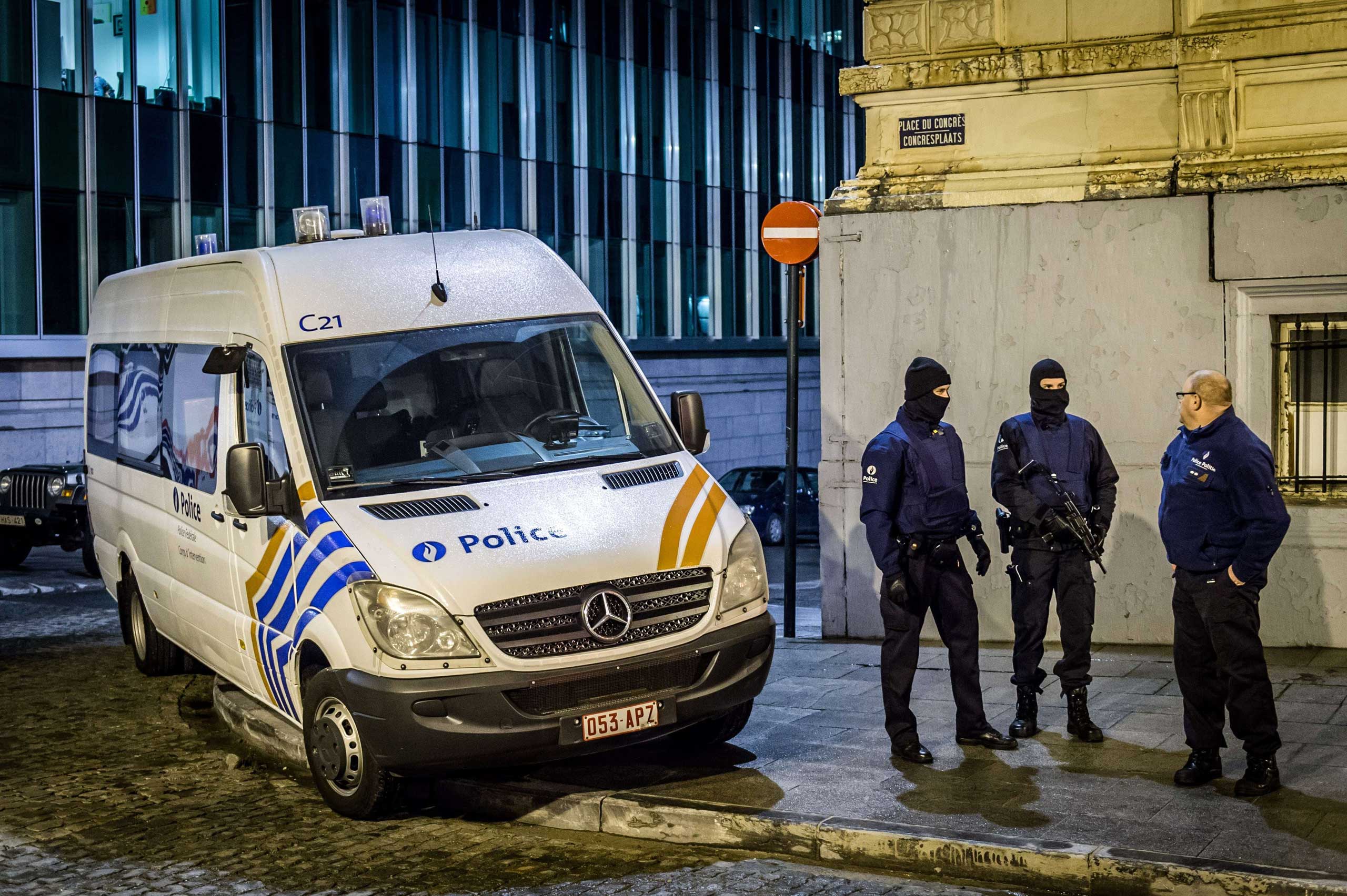 Belgian police stand near the Federal police building at Congress (Colonne du Congres - Congreskolom) in Brussels on Jan. 15, 2015.