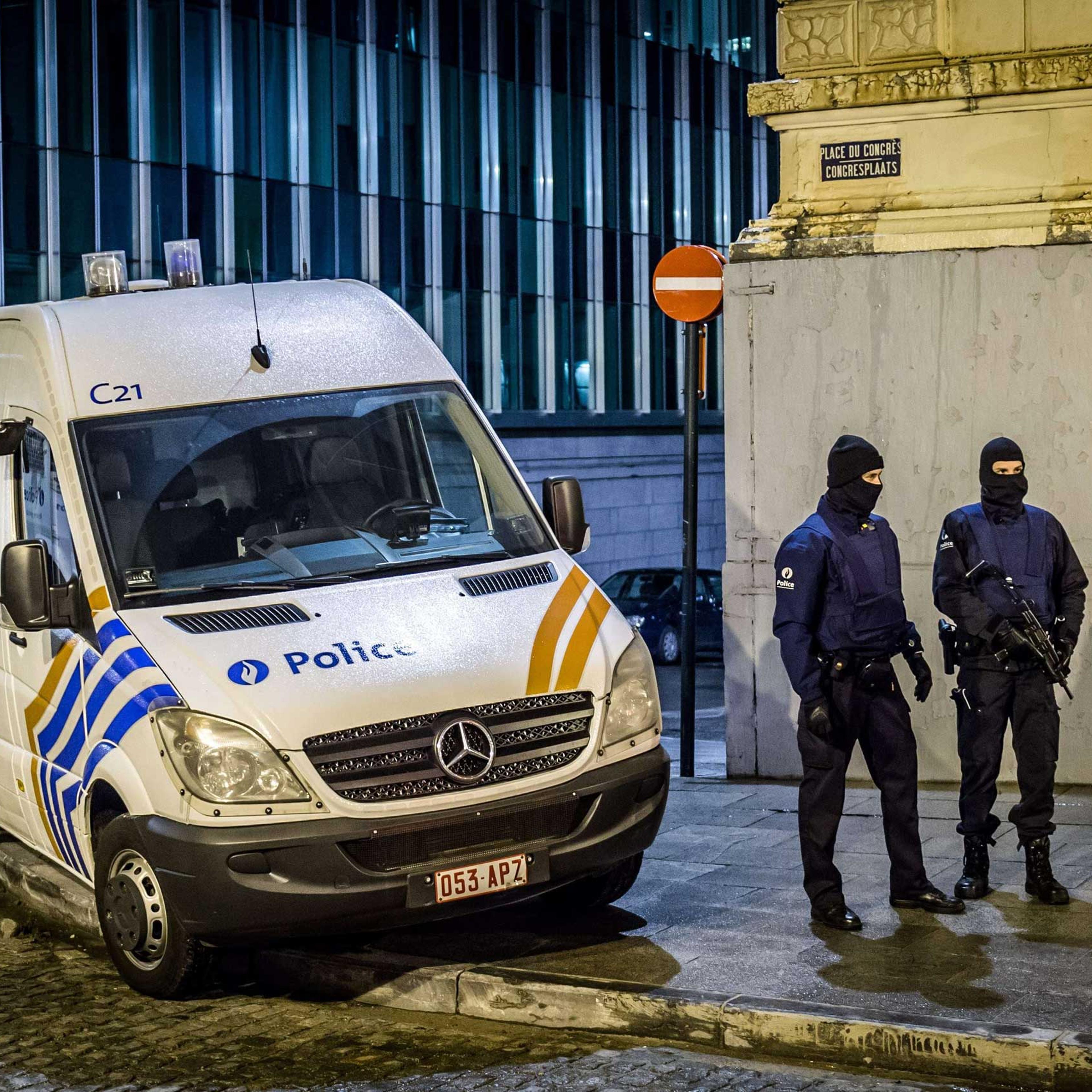 Belgian police stand near the Federal police building at Congress (Colonne du Congres - Congreskolom) in Brussels on Jan. 15, 2015.