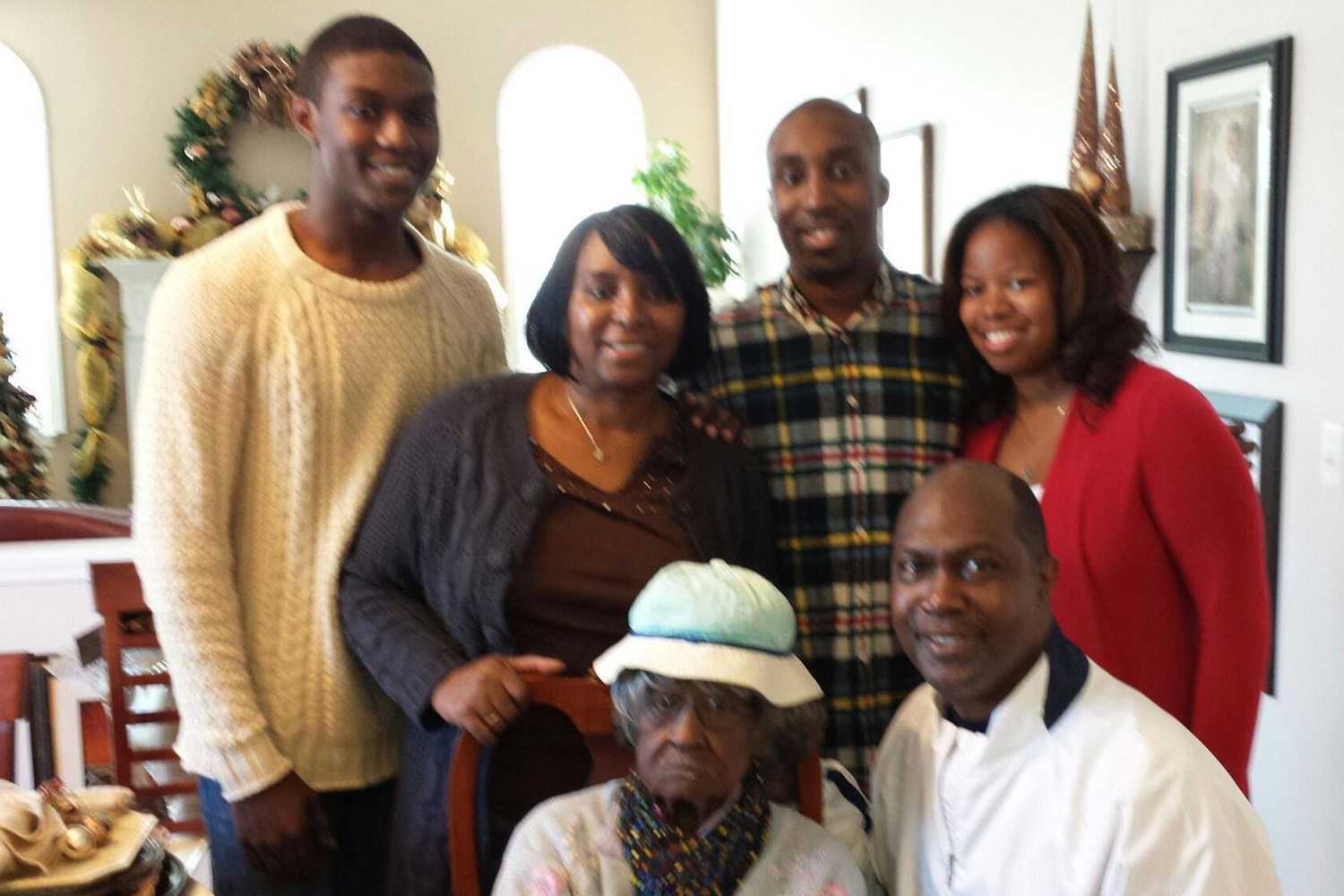 Talley pictured with her fishing buddy Michael Kinloch's family the day after Thanksgiving, November 29, 2013. (L-R) Michael's youngest son and Talley's godson Tyler, Michael's wife Elaine, and Michael's oldest son Ramon and his fiancé Andrea (both doctors), and Michael.