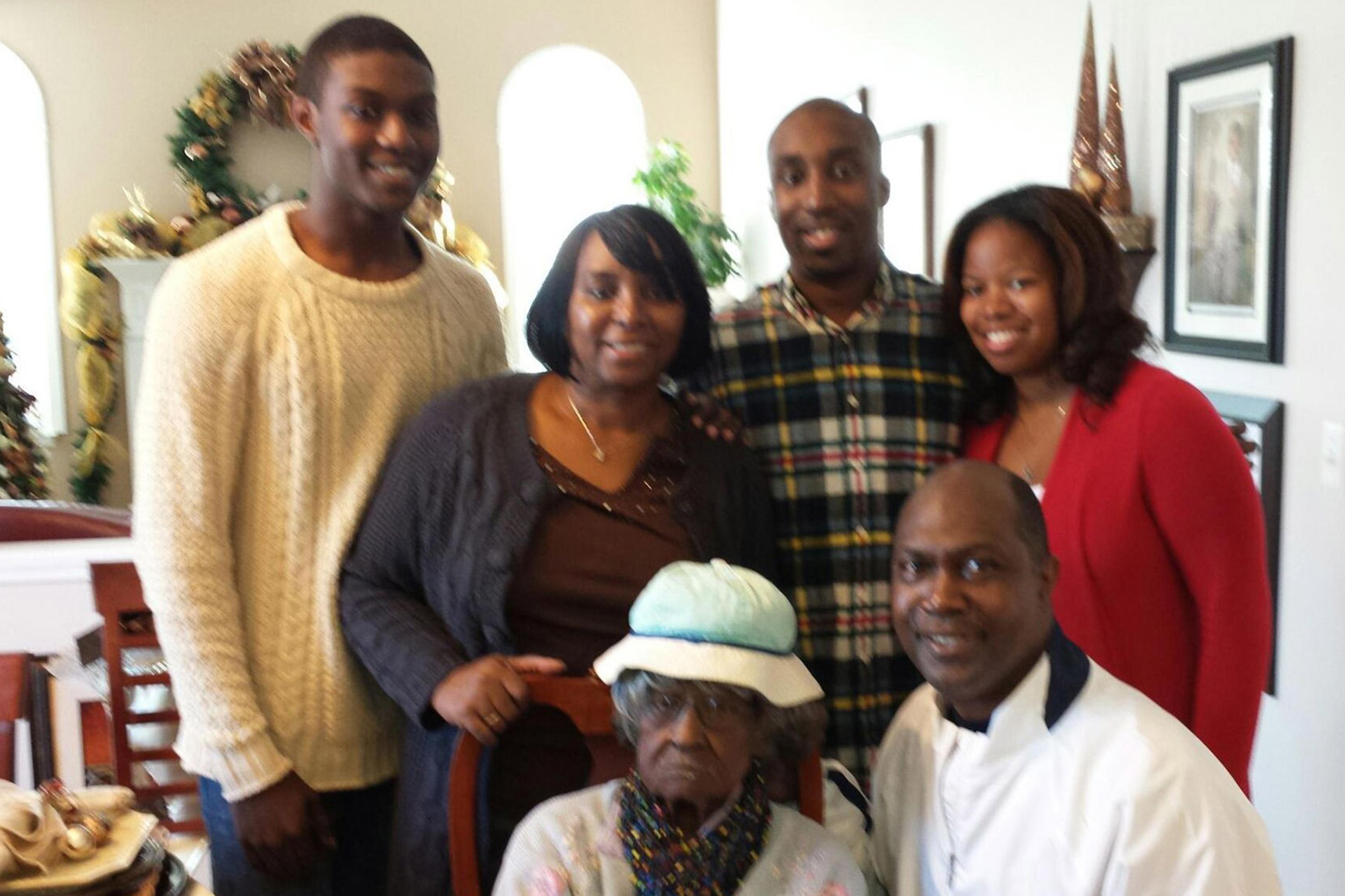 Talley pictured with her fishing buddy Michael Kinloch's family the day after Thanksgiving, November 29, 2013. (L-R) Michael's youngest son and Talley's godson Tyler, Michael's wife Elaine, and Michael's oldest son Ramon and his fiancé Andrea (both doctors), and Michael.