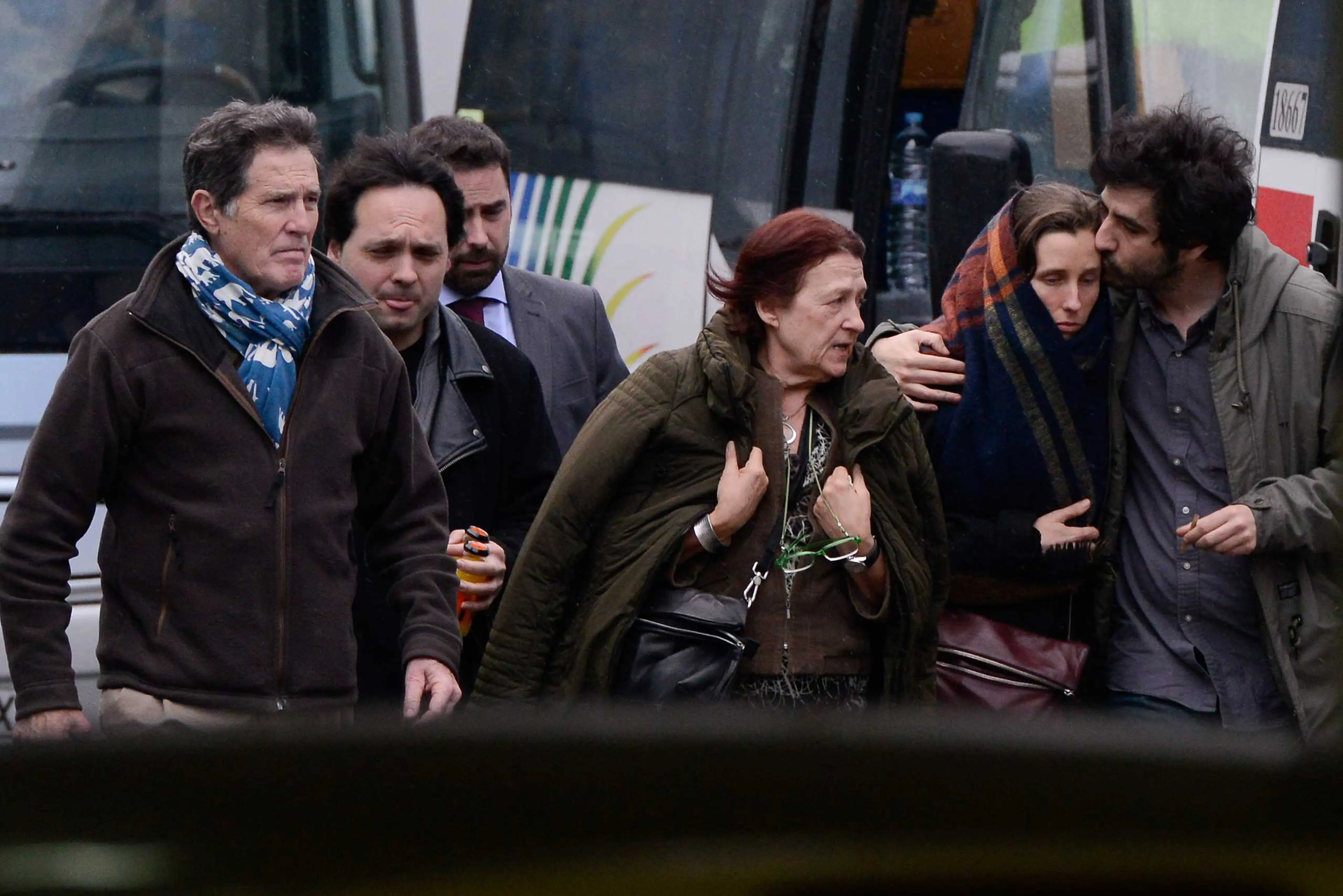 Relatives of passengers of the Germanwings plane crashed in French Alps are seen at the Terminal 2 of the Barcelona El Prat airport on March 24, 2015 in Barcelona.
