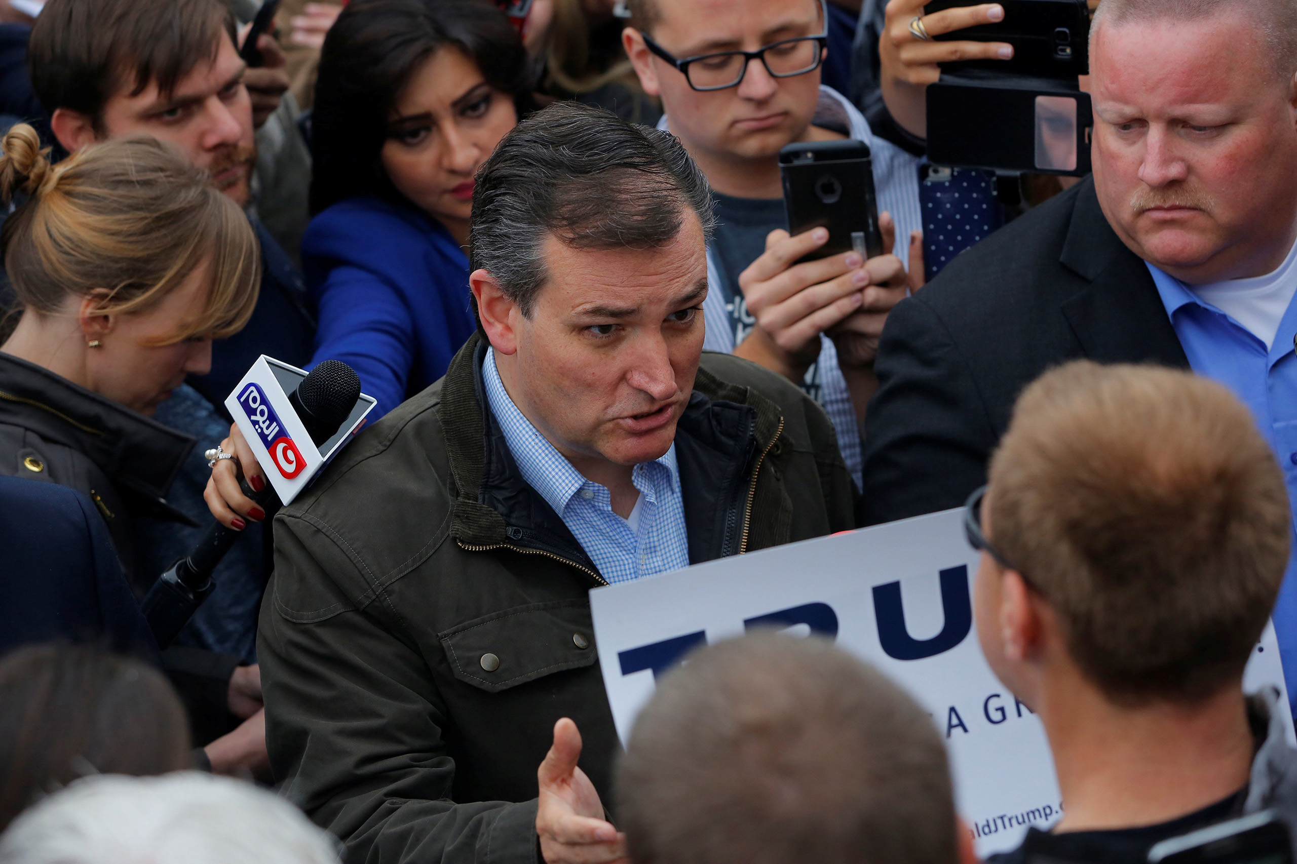 Ted Cruz speaks with supporters of fellow candidate Donald Trump during a campaign event in Marion, Indiana, May 2, 2016.