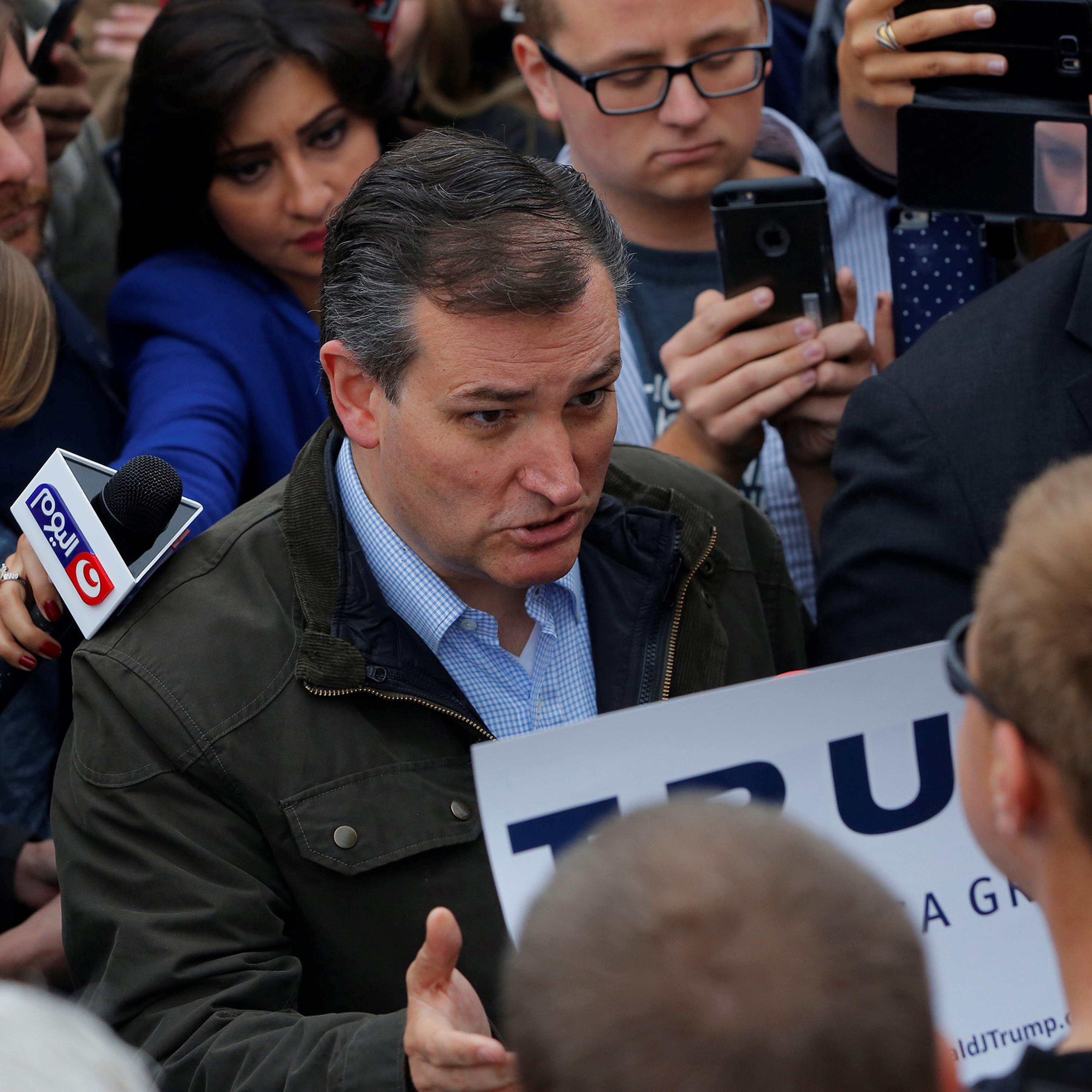 Ted Cruz speaks with supporters of fellow candidate Donald Trump during a campaign event in Marion, Indiana, May 2, 2016.