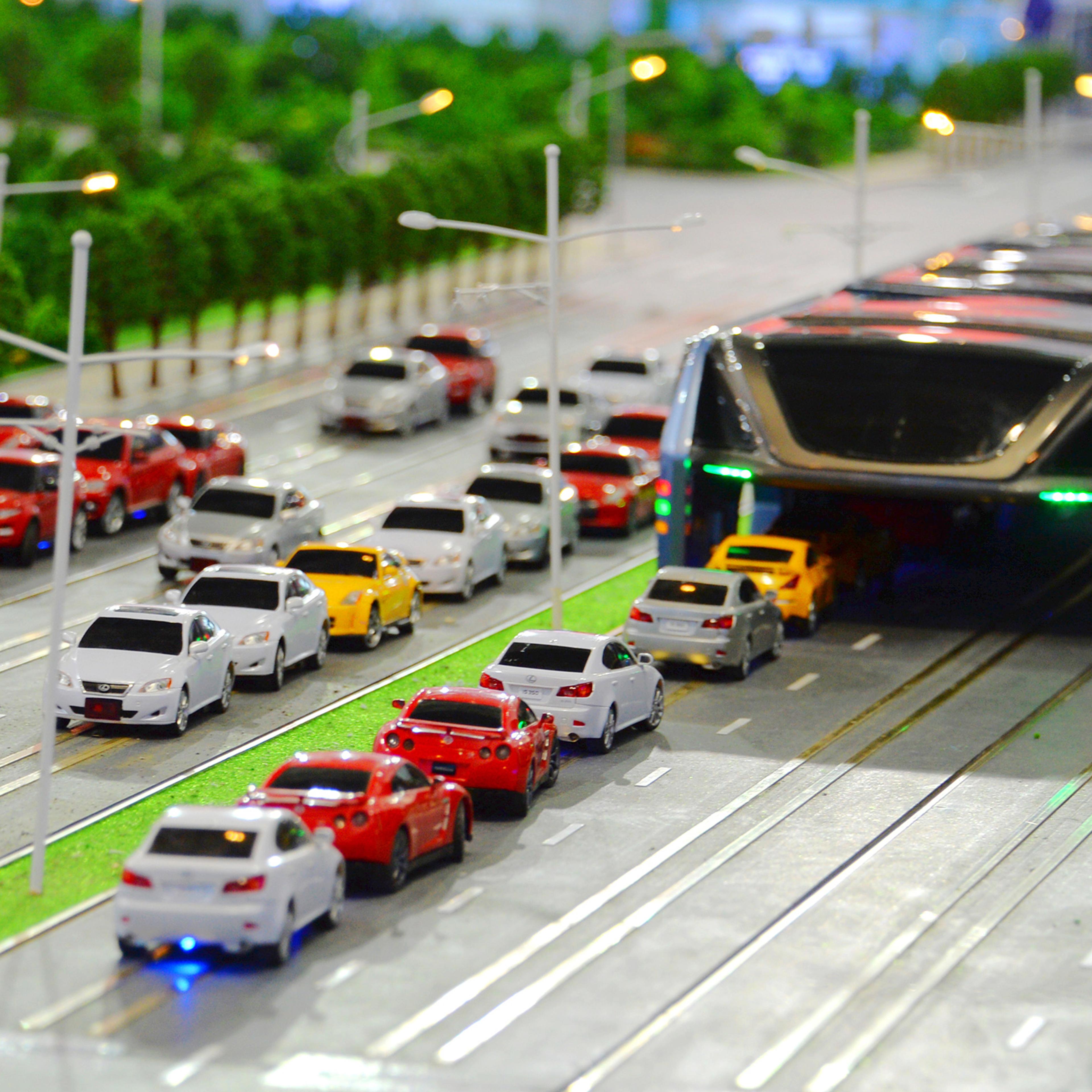 A model of the 'Transit Elevated Bus' is on display during the 19th China Beijing International High-tech Expo (CHITEC) in Beijing, China, May 19, 2016.
