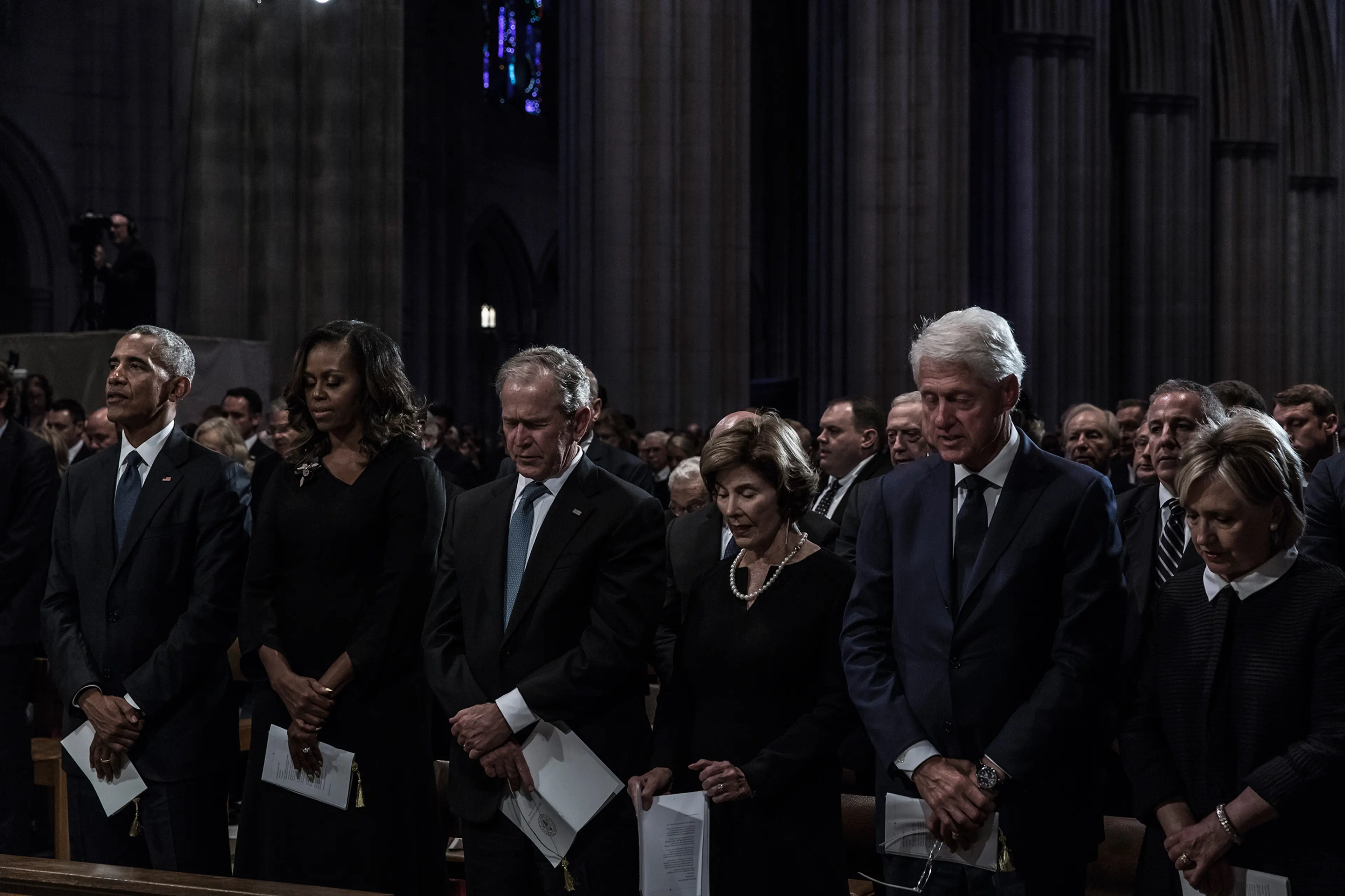 Former US President Barack Obama, Michelle Obama, former President George W. Bush, Laura Bush, former President Bill Clinton and and Hillary Clinton during a memorial service for Senator John McCain at the Washington National Cathedral on September 1, 2018.