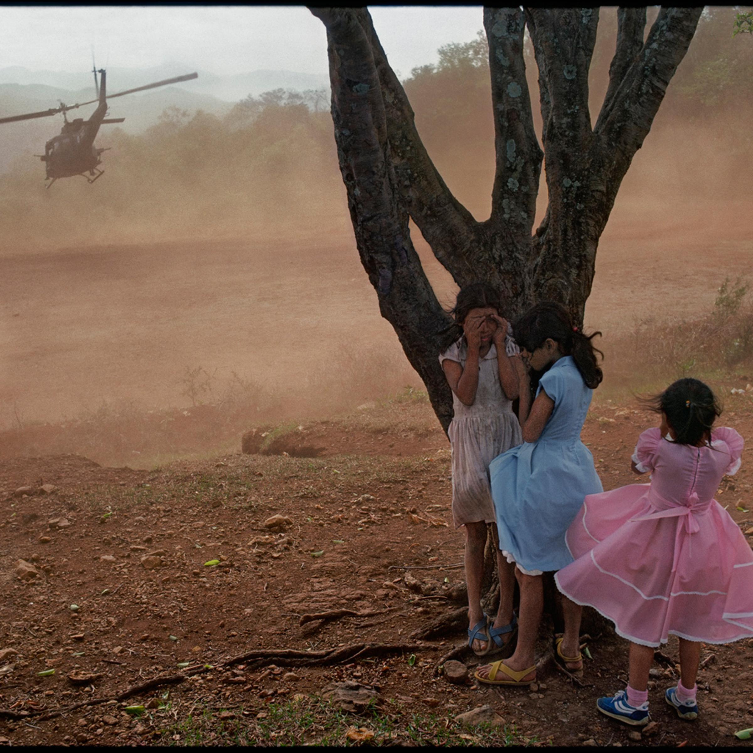 James Nachtwey was awarded the Dresden International Peace Prize on Feb. 11. The remarks delivered by Wim Wenders, below in full, touched on this image from 1984, of the Army evacuating wounded soldiers from a village football field in El Salvador.