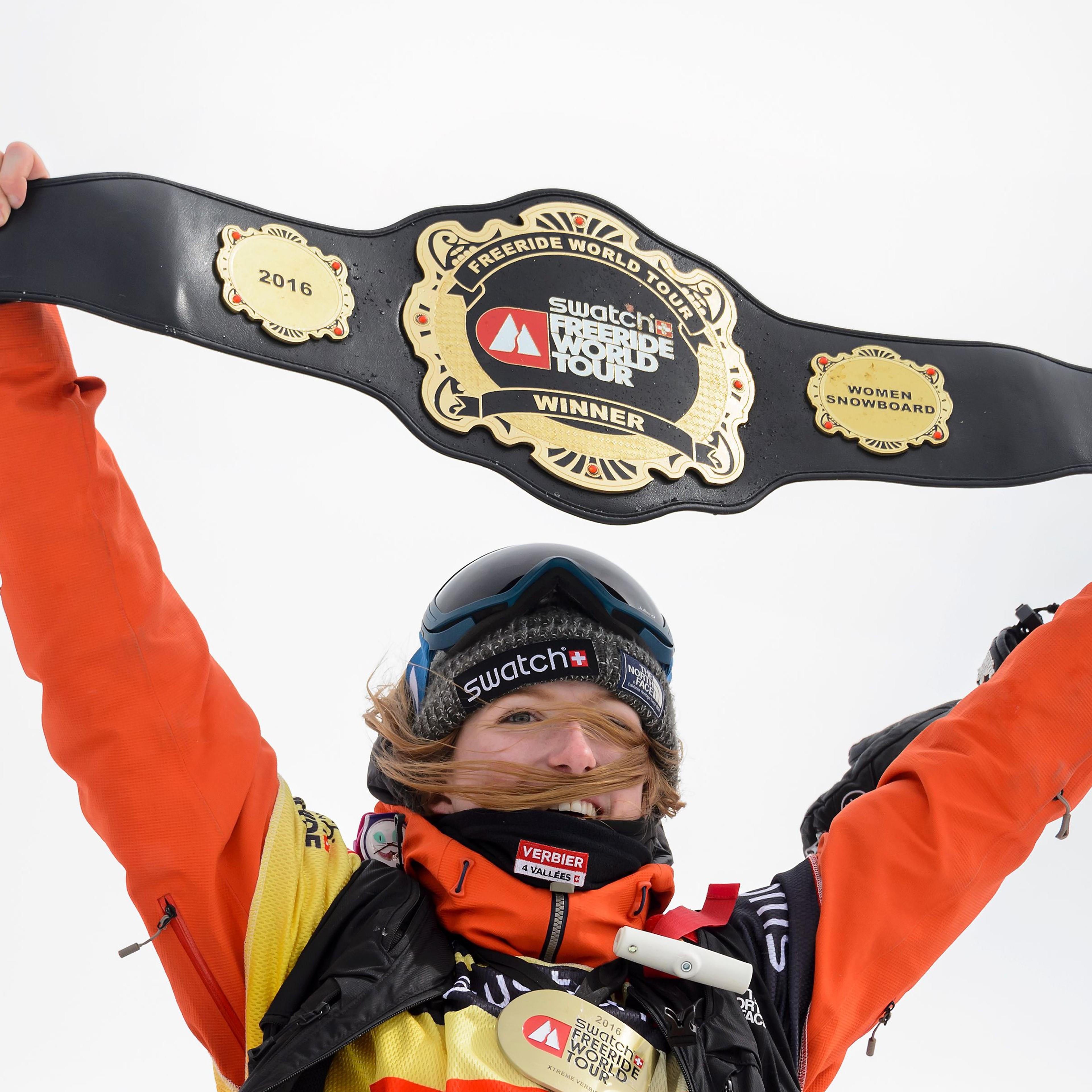 World champion Switzerland's Estelle Balet waves with the overall belt after she won the women's snowboard event at the Bec des Rosses during the Verbier Xtreme Freeride World Tour final on April 2, 2016 above the Swiss Alps resort of Verbier.
