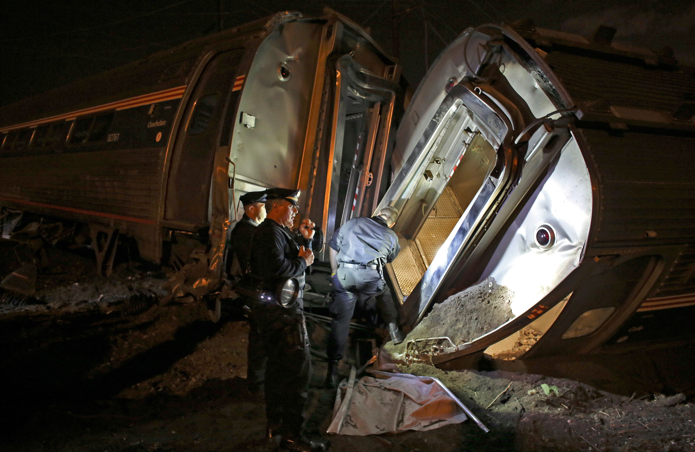 Emergency personnel work the scene of the Amtrak train wreck on May 12, 2015 in Philadelphia.