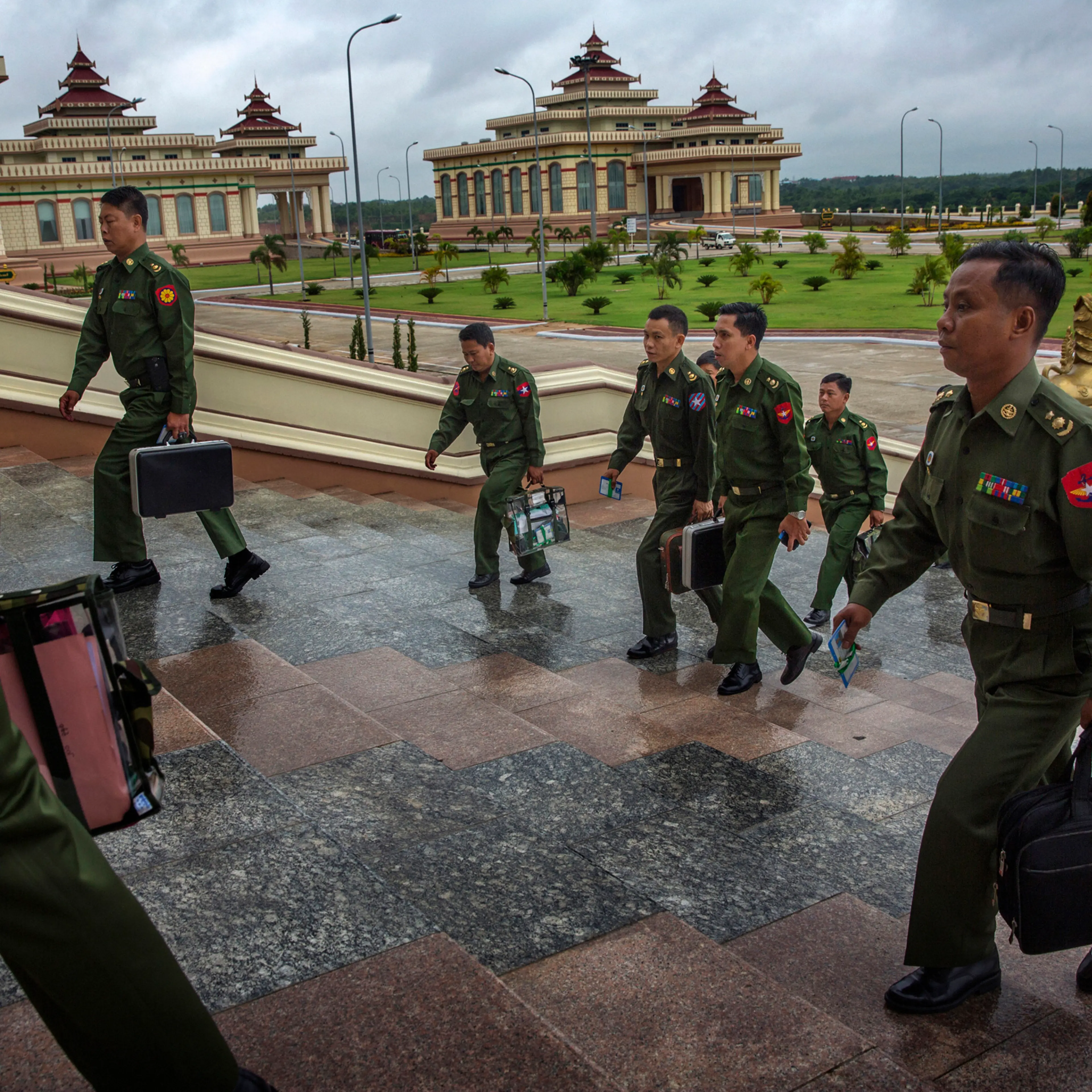 MPs representing the military arrive for a parliamentary session in the Naypyidaw, Burma, June 20th, 2014.