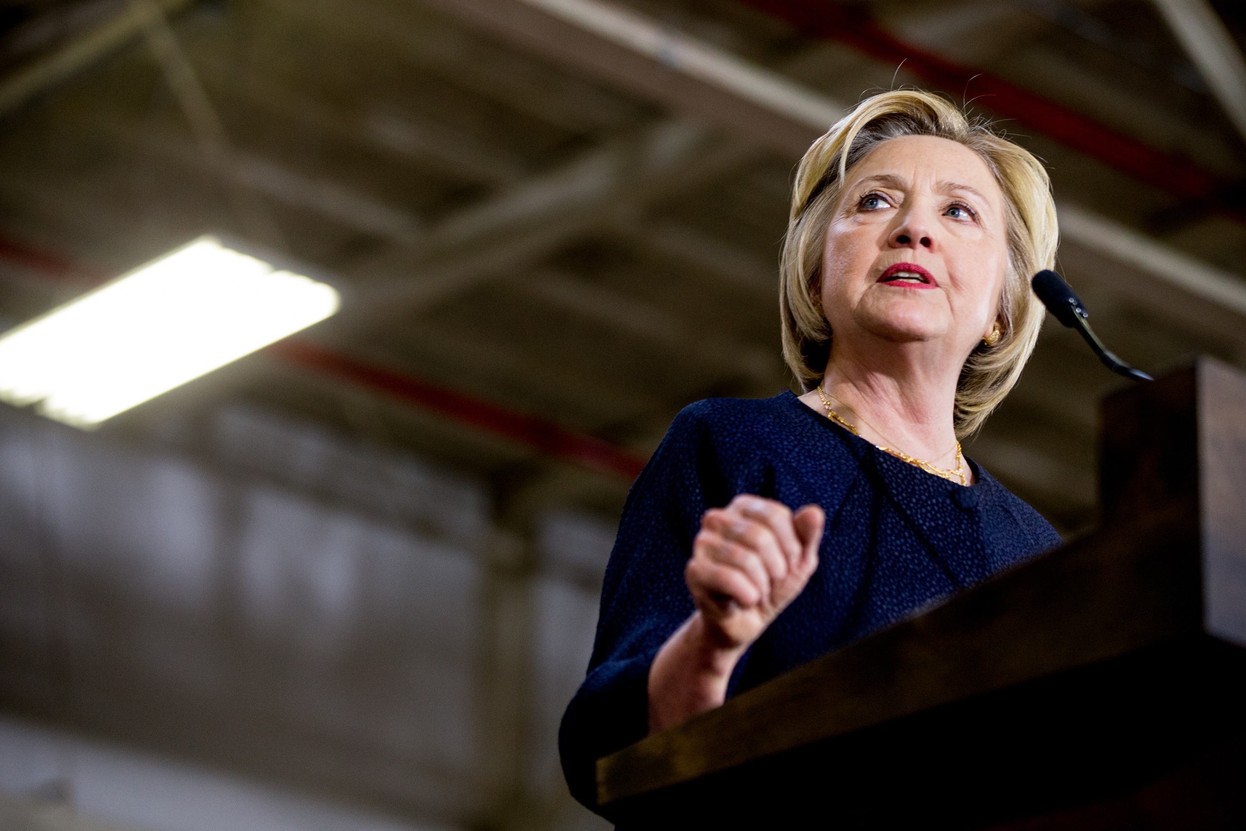 Democratic presidential candidate Hillary Clinton speaks at a rally at a warehouse for the company "Team Wendy" which produces helmets for military, law enforcement, and rescue teams, in Cleveland, Monday, June 13, 2016. (AP Photo/Andrew Harnik)