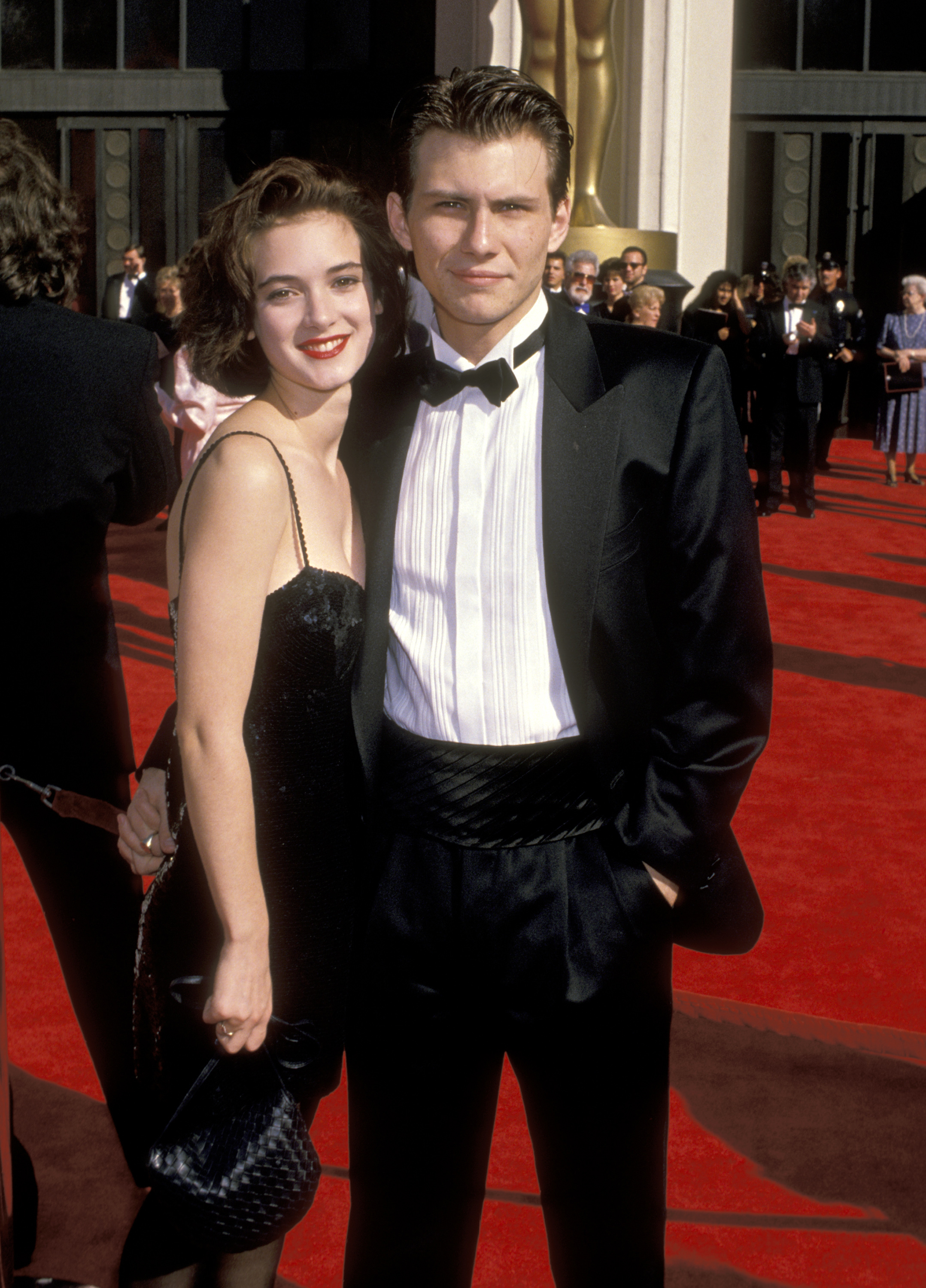 Winona Ryder and Christian Slater arrive at the 61st Academy Awards in Los Angeles, California on March 29, 1989.