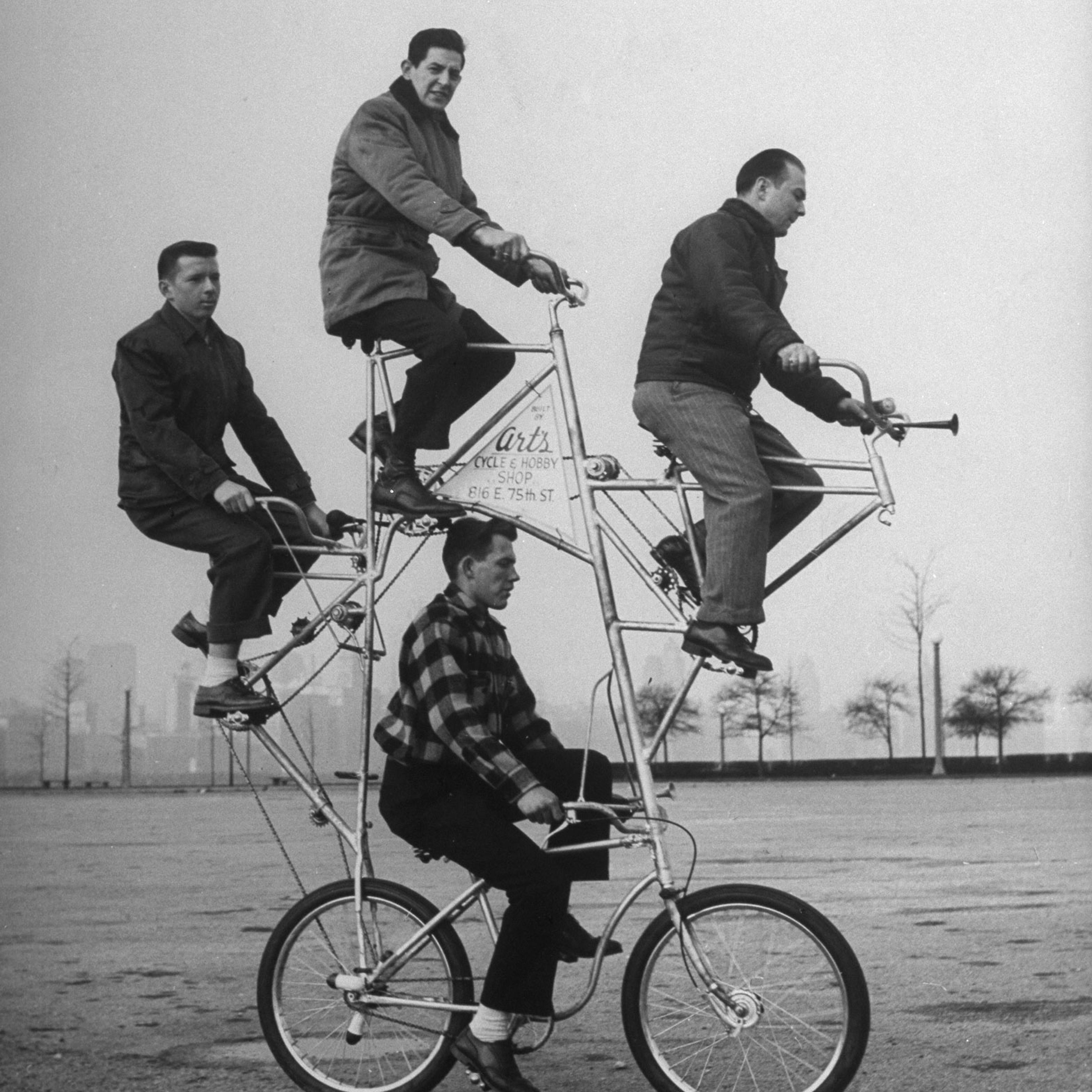 Eccentric four-man bicycle built by Art Rothchild (top position).