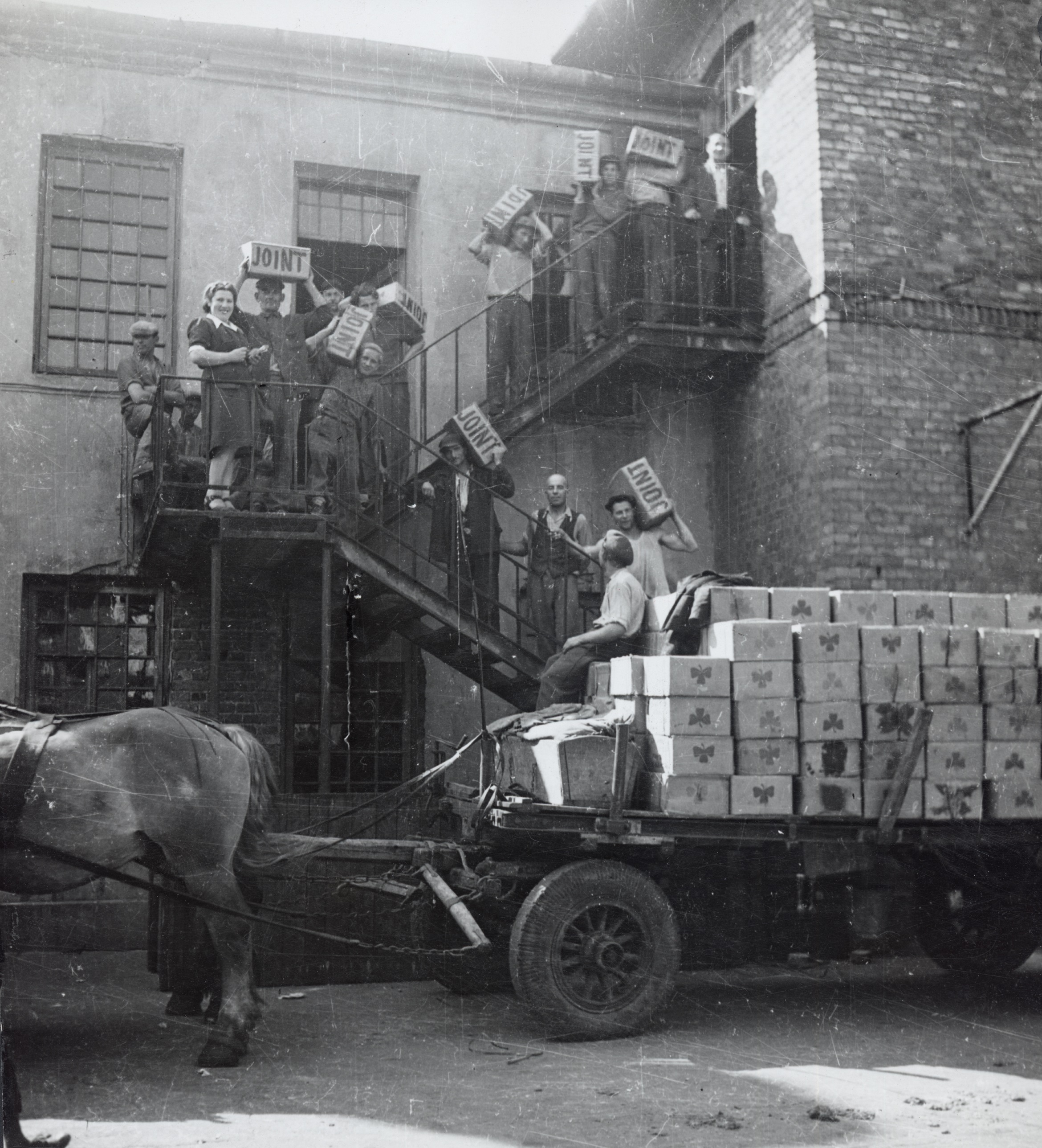 Transporting of supplies labeled “Joint” to a warehouse, Warsaw, c. 1946-47.