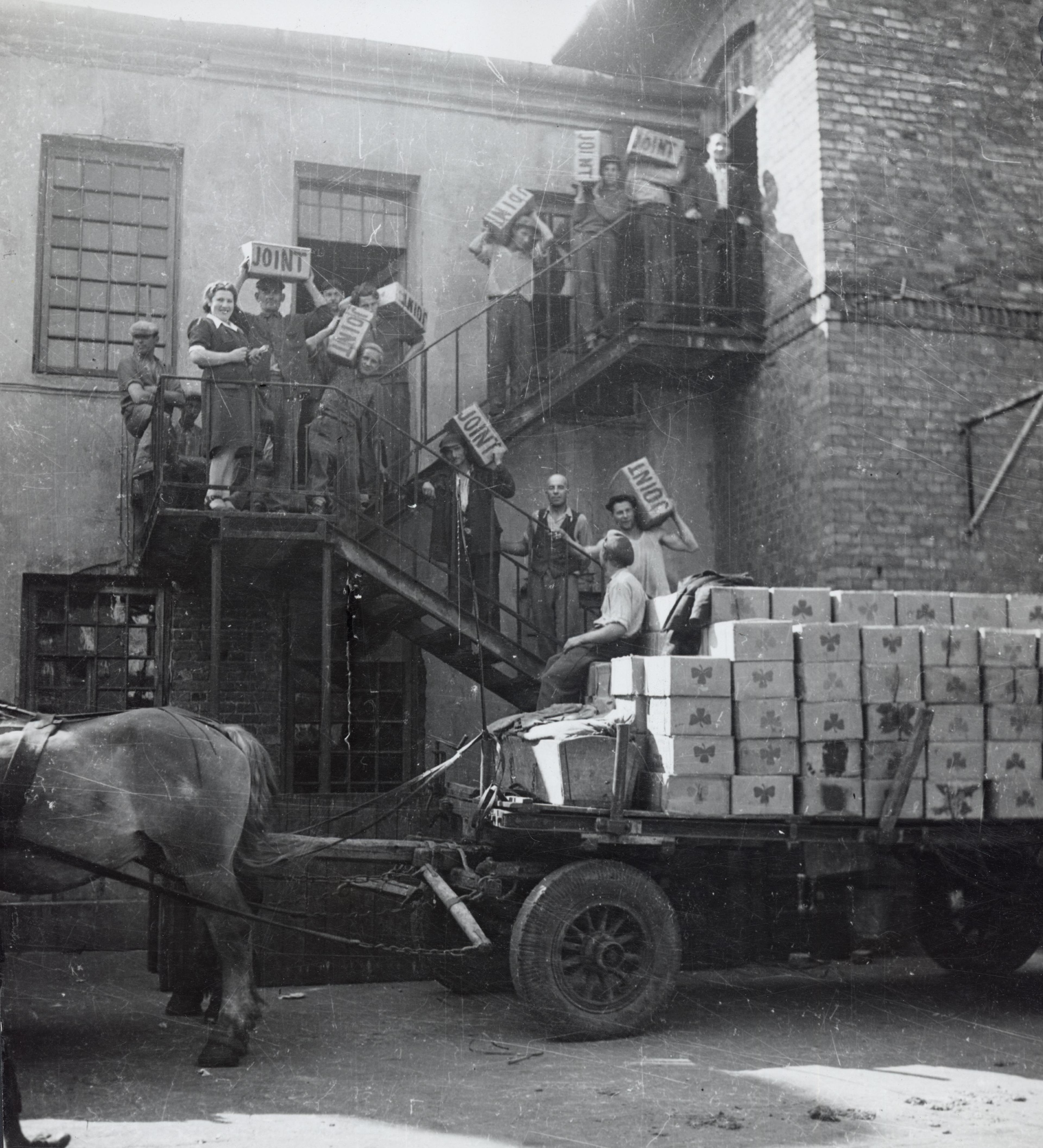 Transporting of supplies labeled “Joint” to a warehouse, Warsaw, c. 1946-47.