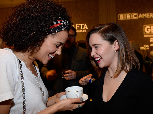 Nathalie Emmanuel and Emilia Clarke attend the BAFTA Los Angeles Awards Season Tea at Four Seasons Hotel Los Angeles at Beverly Hills on January 9, 2016 in Los Angeles, California.